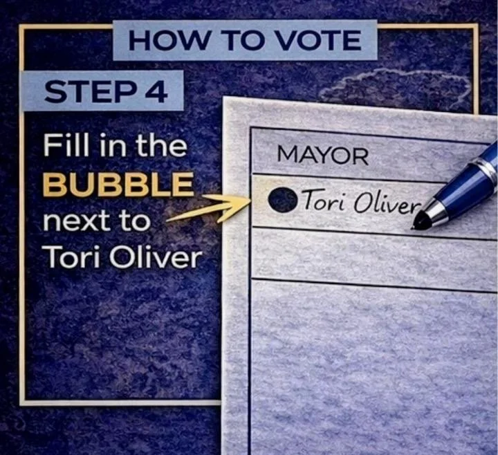A voting ballot with a filled-in bubble next to the name Tori Oliver for mayor, alongside a blue pen and instructions for filling in the bubble.