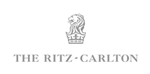Logo of The Ritz-Carlton with a lion crest above the text.