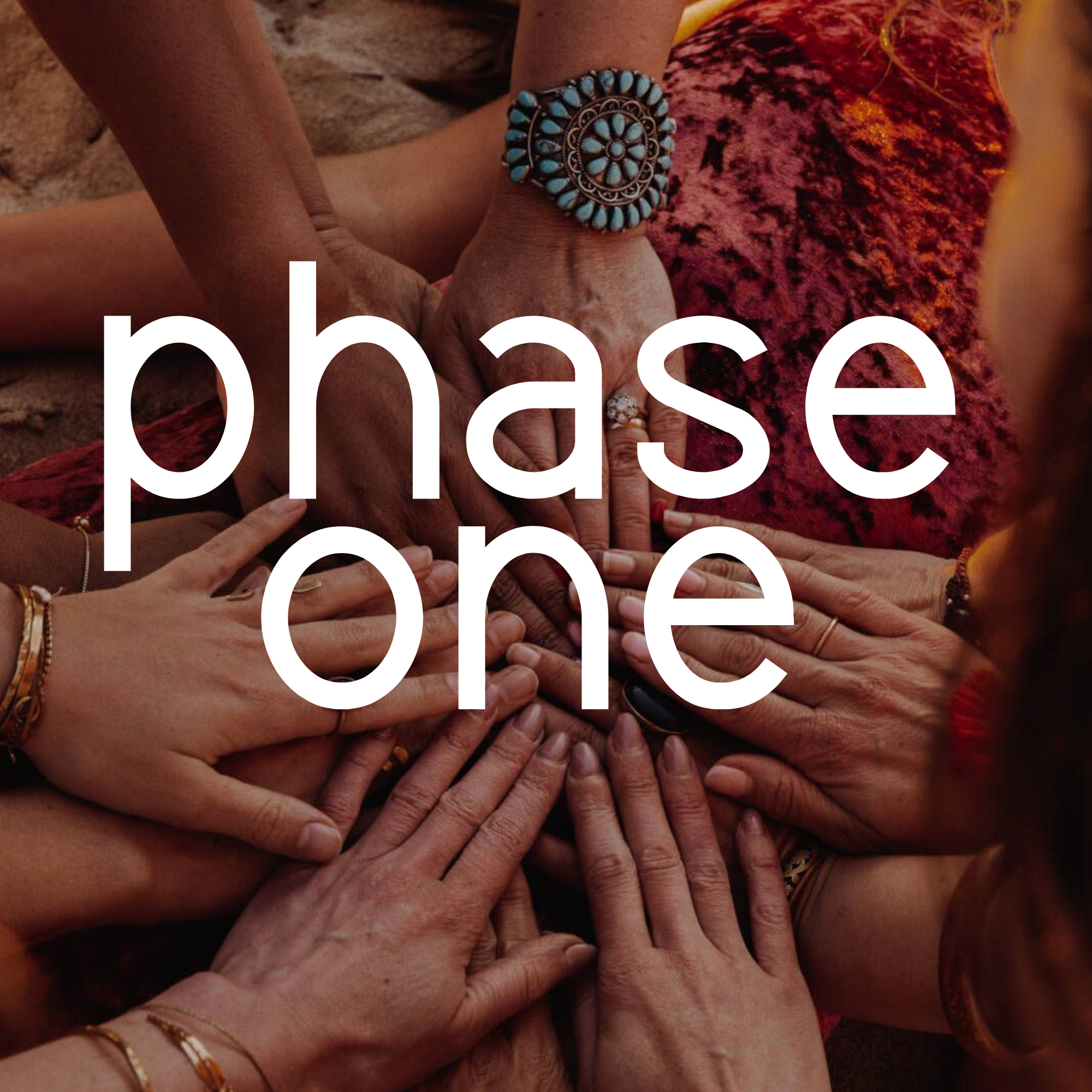 Multiple hands of diverse individuals layered over each other on a person's body, with some wearing jewelry and a decorative bracelet. The background includes a red and black-patterned surface, likely fabric or clothing.