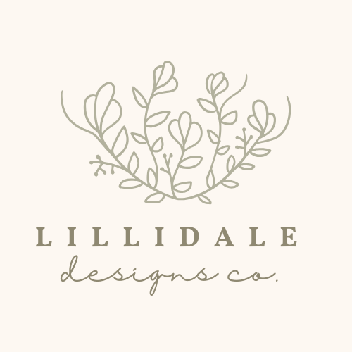 Minimalist logo featuring a gray leafy branch with the text 'LILLIDALE designs co.' beneath in a mix of serif and cursive fonts.