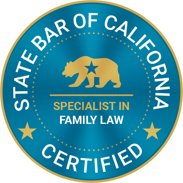 Seal from the State Bar of California indicating specialization in family law, with a bear and star emblem, blue background, and gold accents.