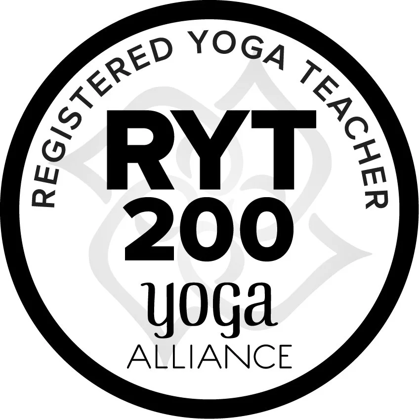 Black and white circular logo for the Registered Yoga Teacher (RYT) 200 yoga alliance, featuring the text "RYT 200 yoga alliance" and the inner words "registered yoga teacher" and "yoga".