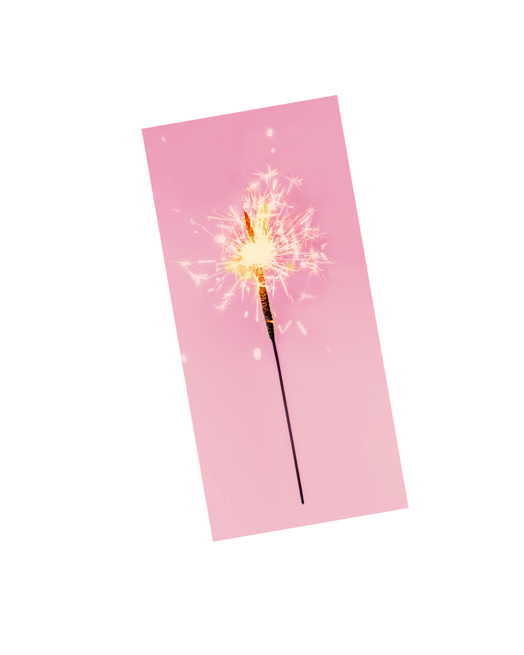 Pink background with a lit sparkler emitting bright sparks.