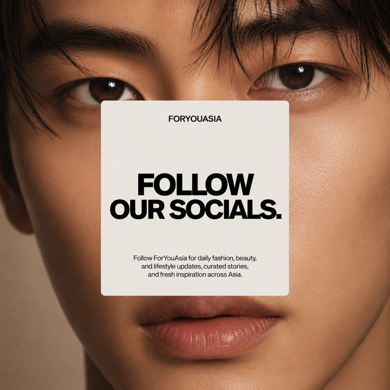 Close-up photo of a person's face with a sign covering the nose and mouth. The sign reads 'FOLLOW OUR SOCIALS.' and promotes following ForYouAsia for fashion, beauty, lifestyle updates, and inspiration across Asia.