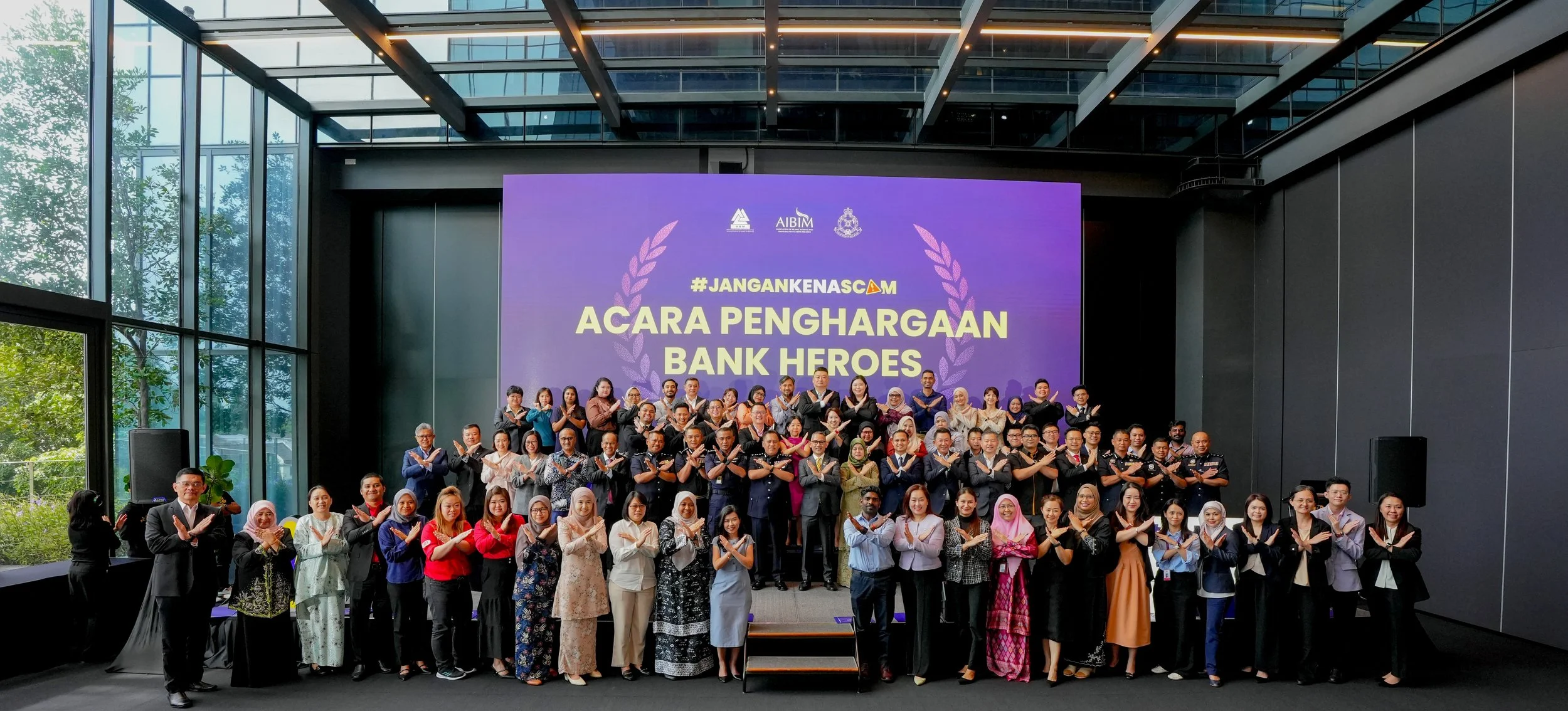 Bank employees recognised at the Jangan Kena Scam Bank Heroes Recognition Event 2026 in Malaysia