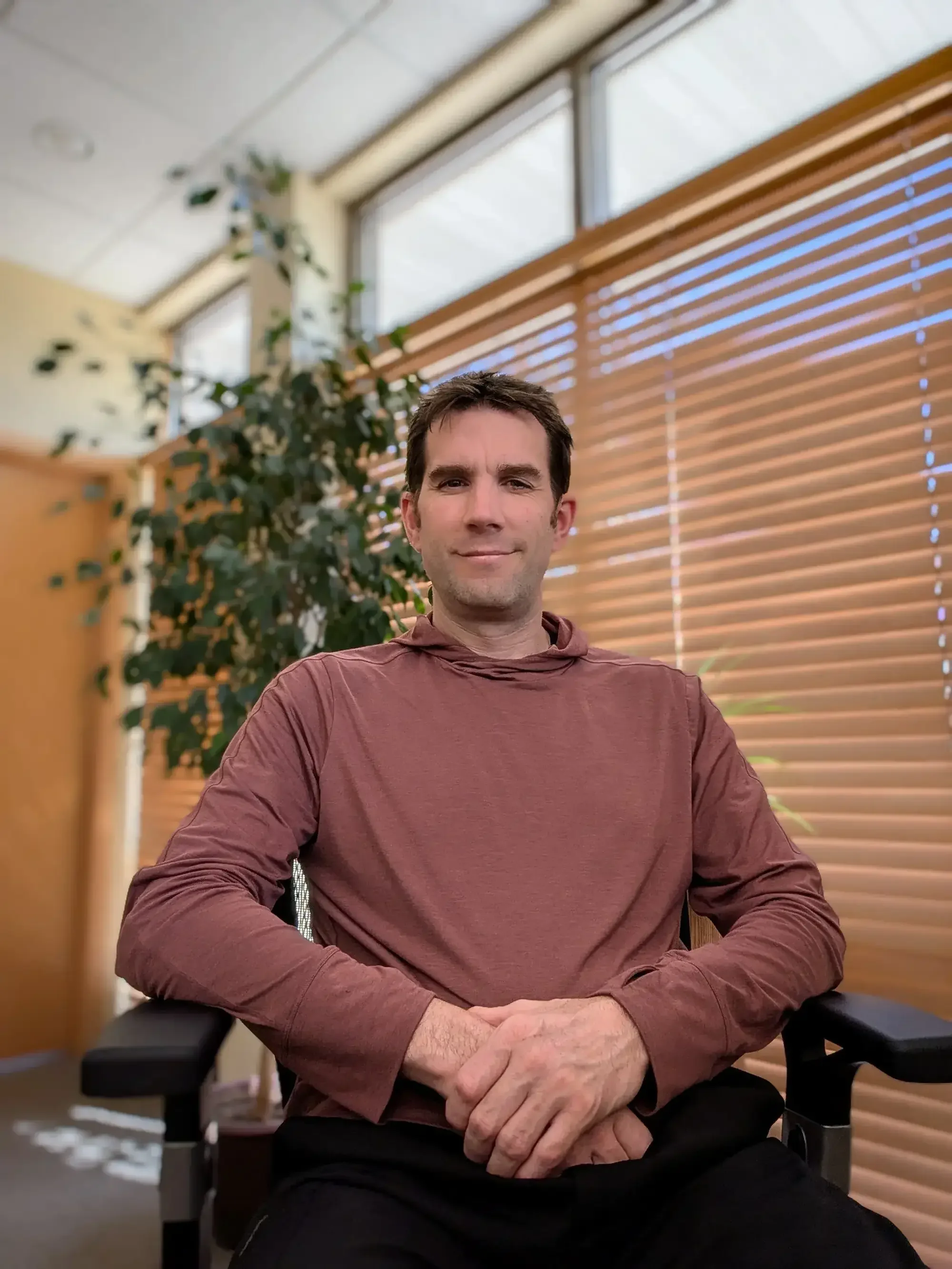 Rob Weingeist sitting in the clinic office