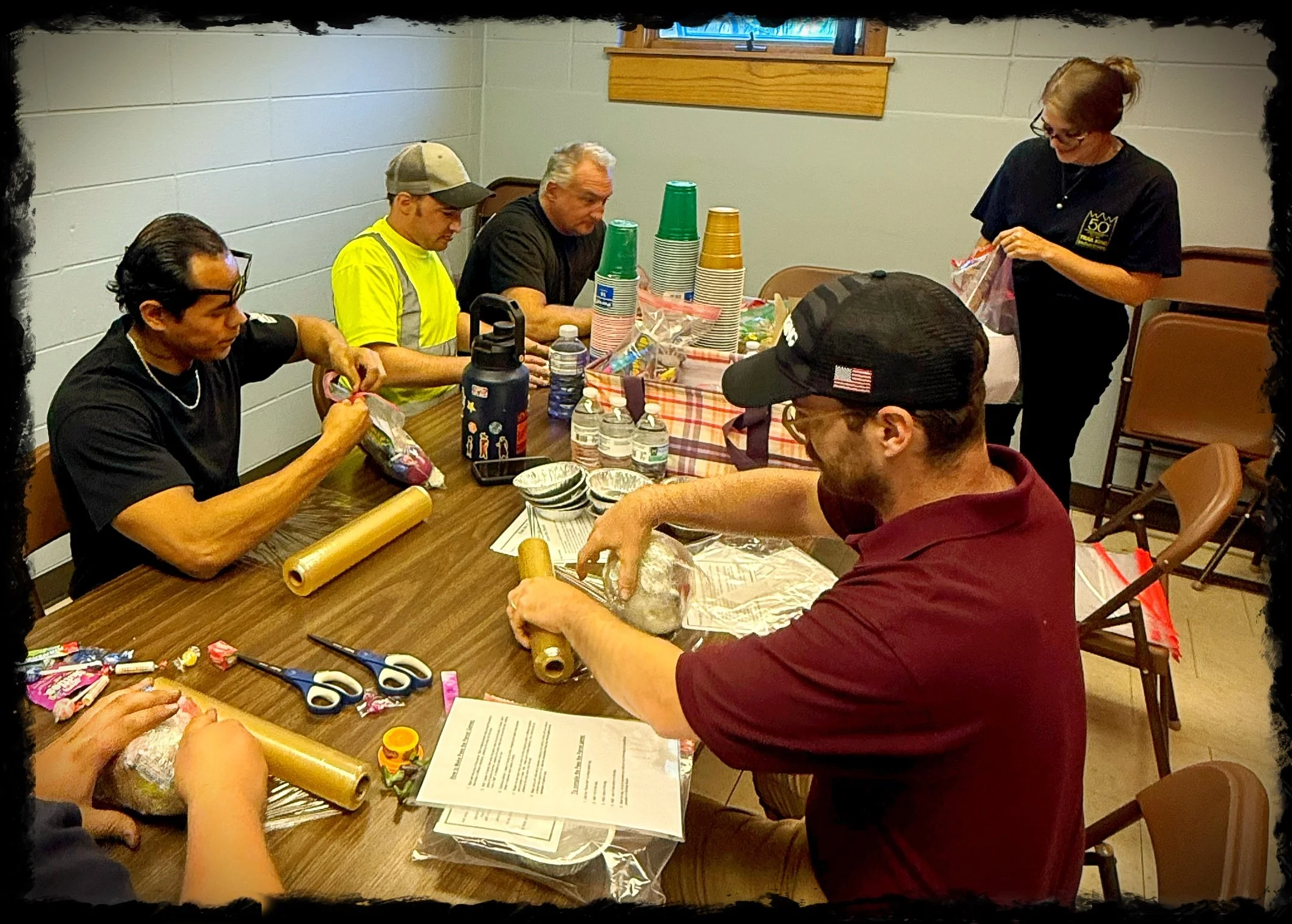 Trail King assembling Pass the Parcel games. 