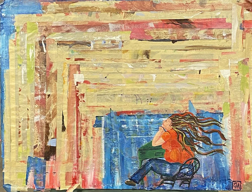 A young woman with long brown hair blowing, wearing an orange top and blue pants, sitting at a desk, chin resting on hands, painted on colorful used masking tape.