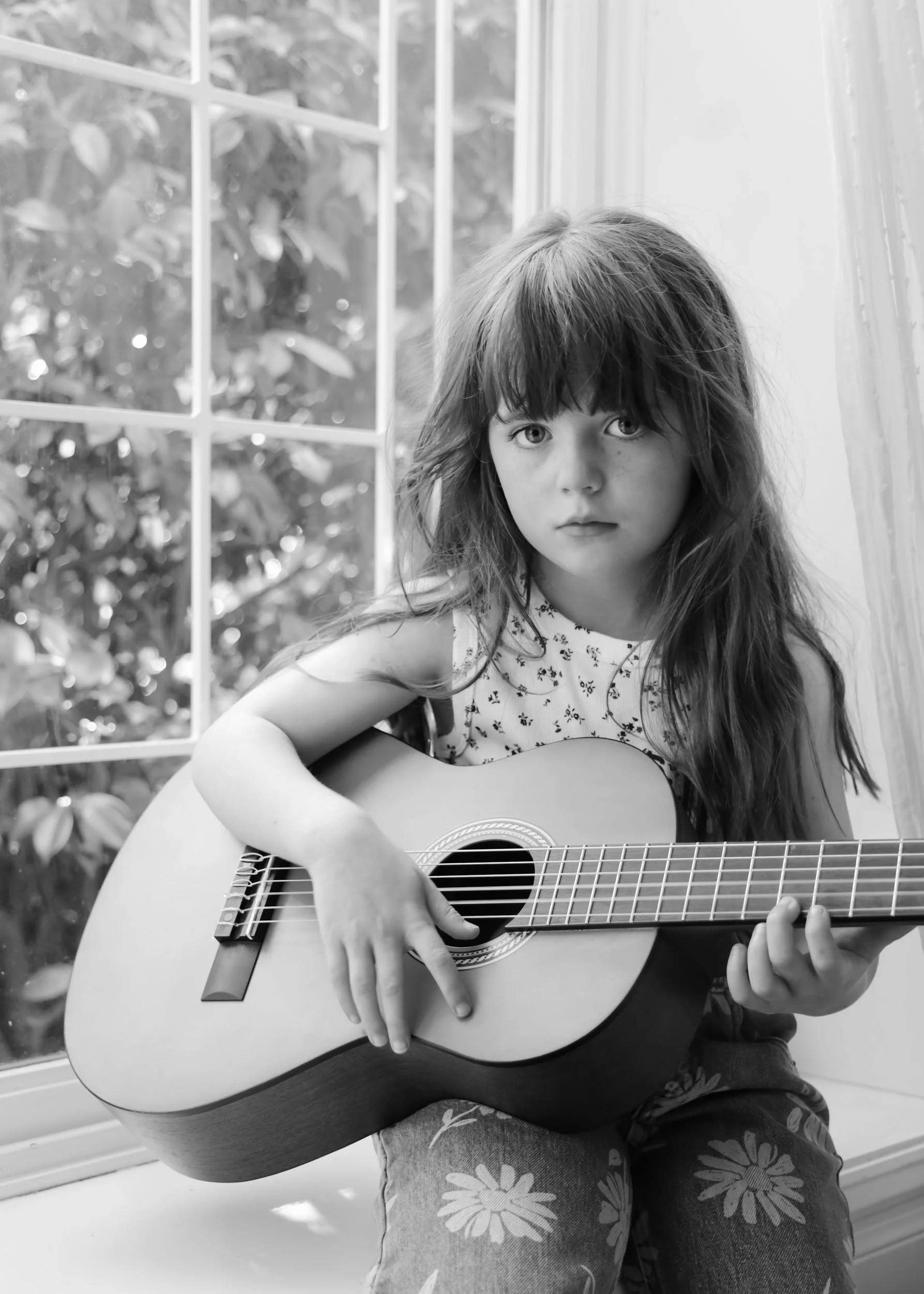 Black and white child portrait with guitar by Georgie Meadows Creative Sydney  