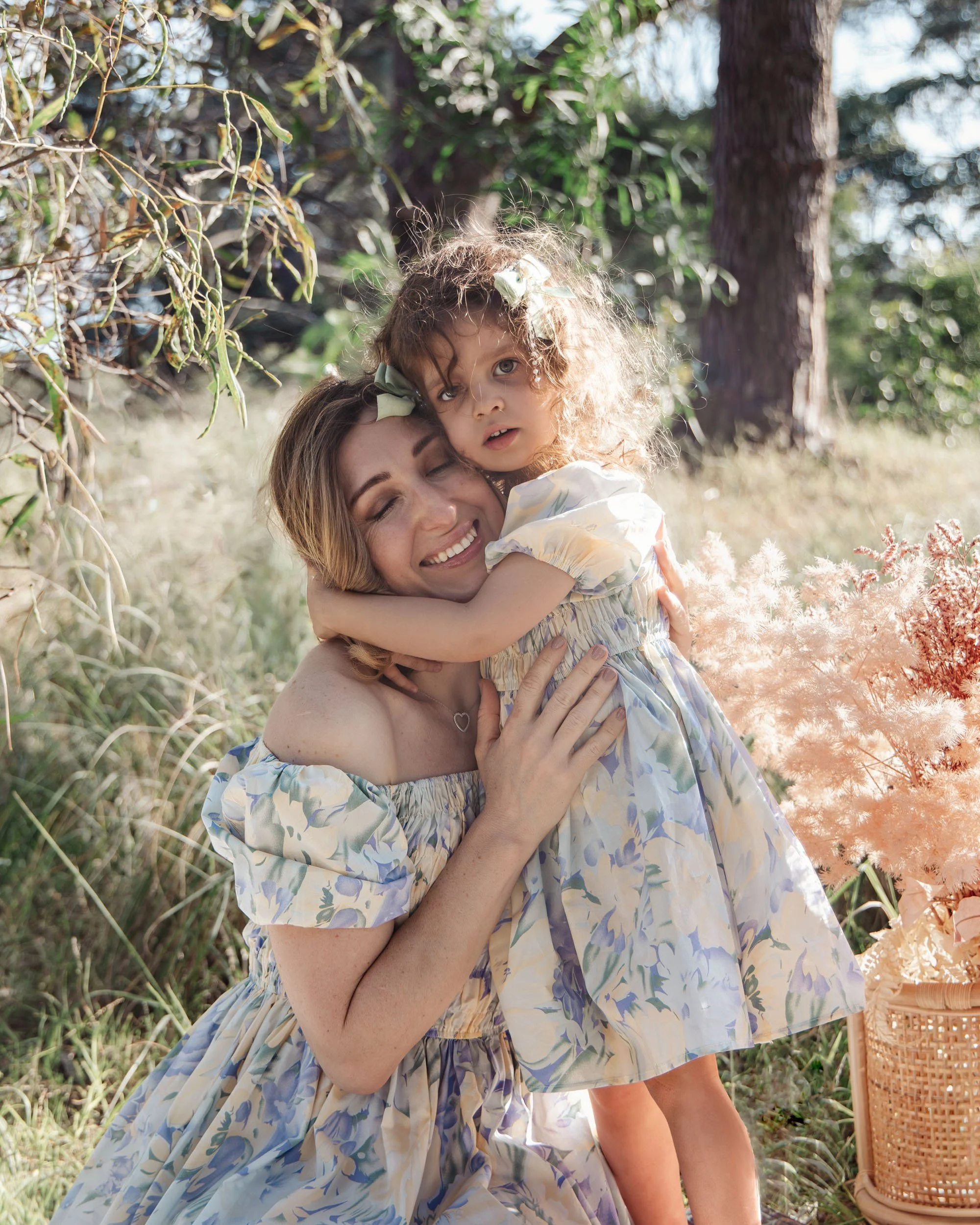 mother and child embrace centennial park sydney by family photographer Georgie Meadows Creative