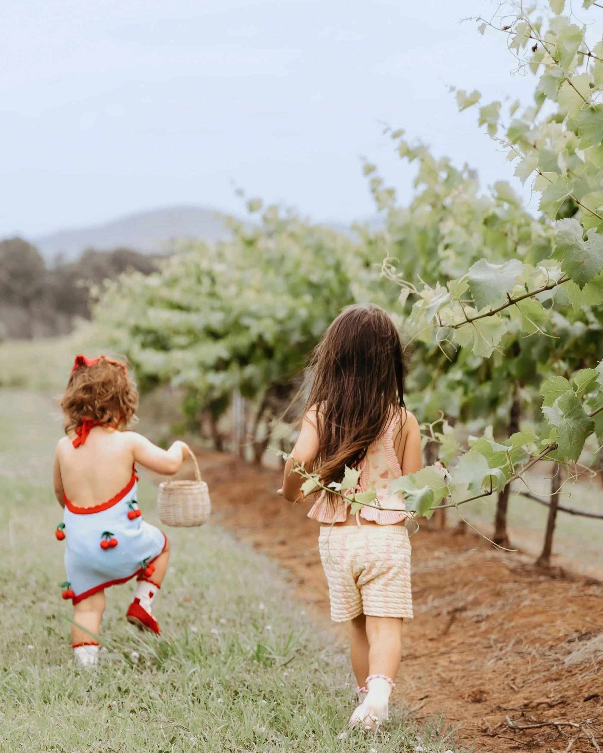 Children walking outdoors in natural light by Sydney family photographer Georgie Meadows Creative  