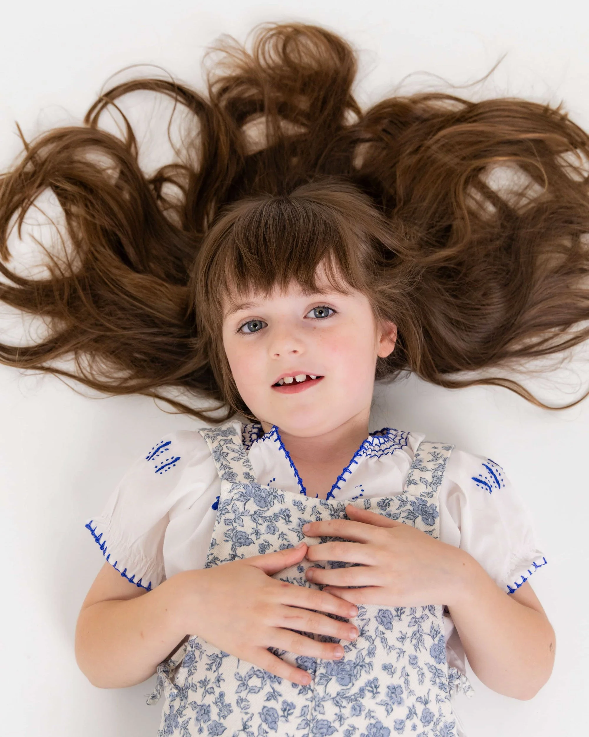 Soft natural light child portrait with flowing hair by Sydney family photographer Georgie Meadows Creative  