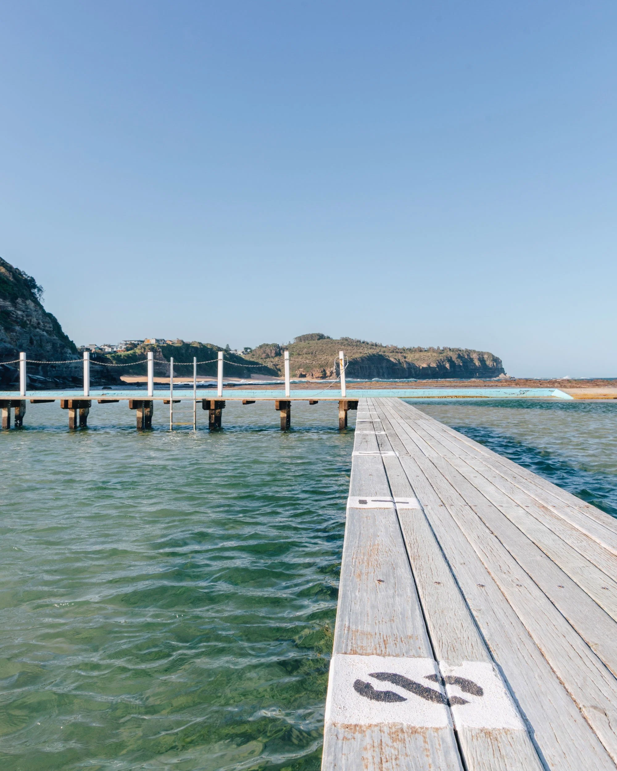 Sydney coastal photography of ocean pool and jetty with clear blue water