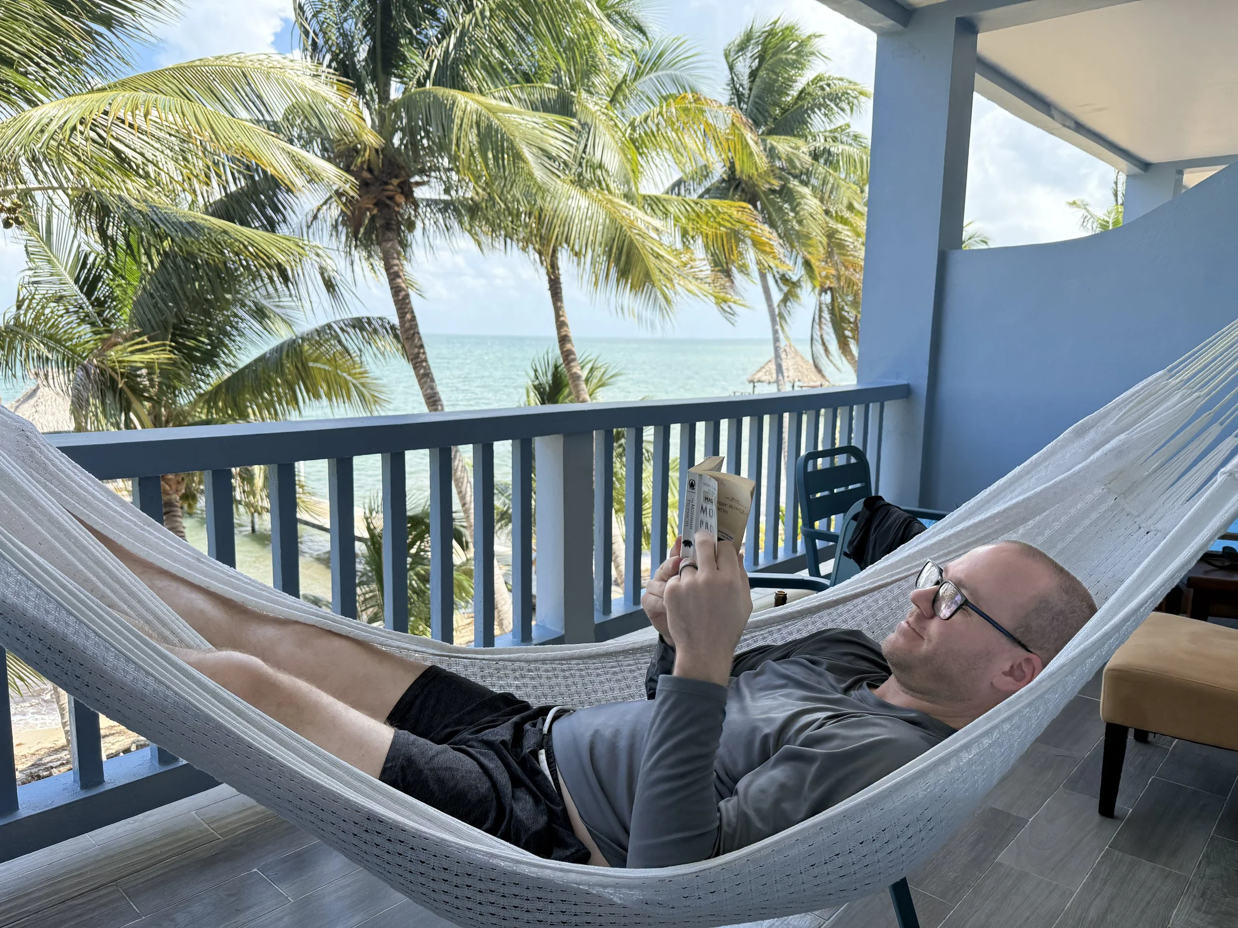 alex sitting in hammock