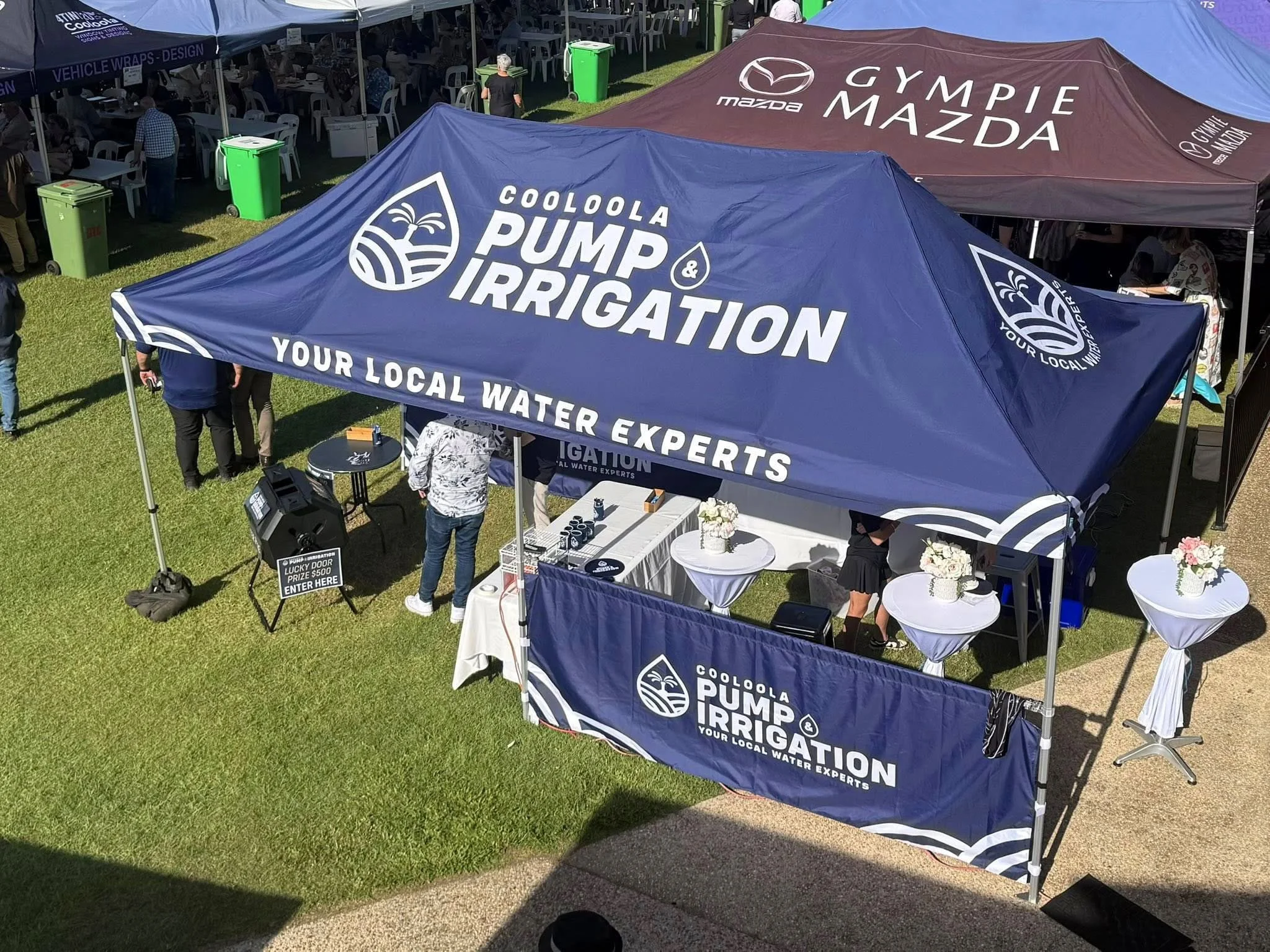 Cooloola Pumps & Irrigation marquee setup at local event