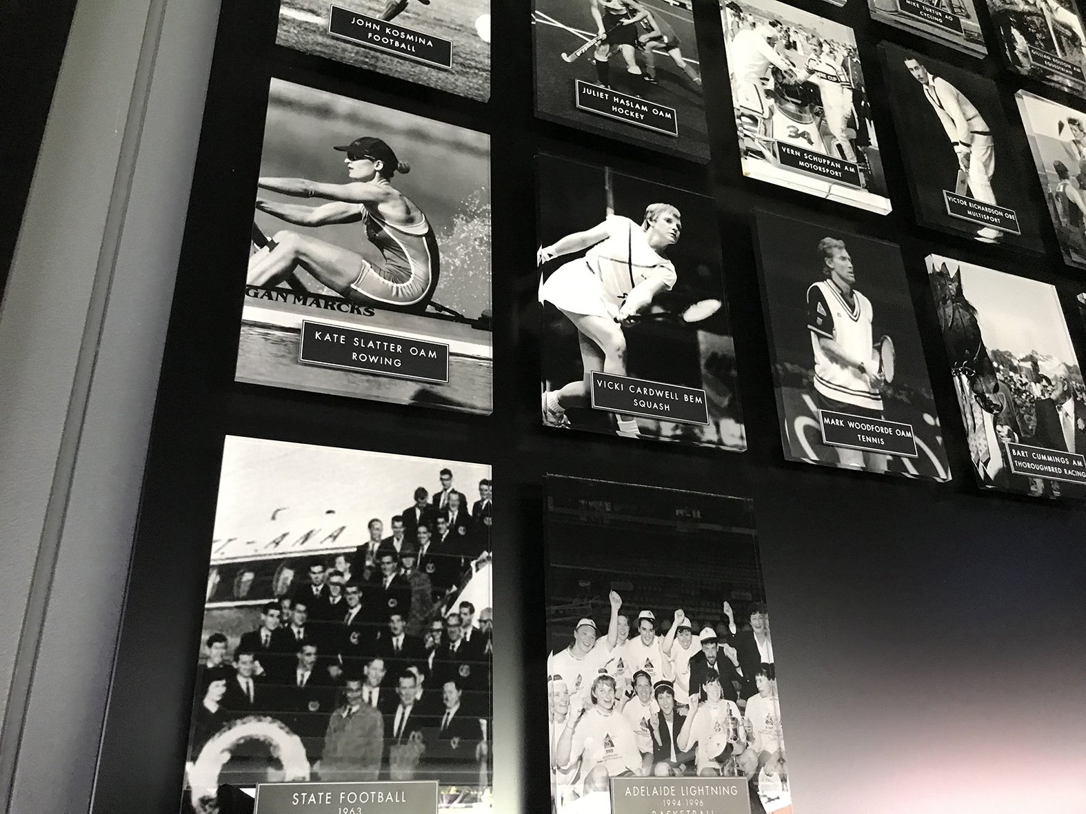 Wall mounted acrylic boards with digital graphics & engraved plaques