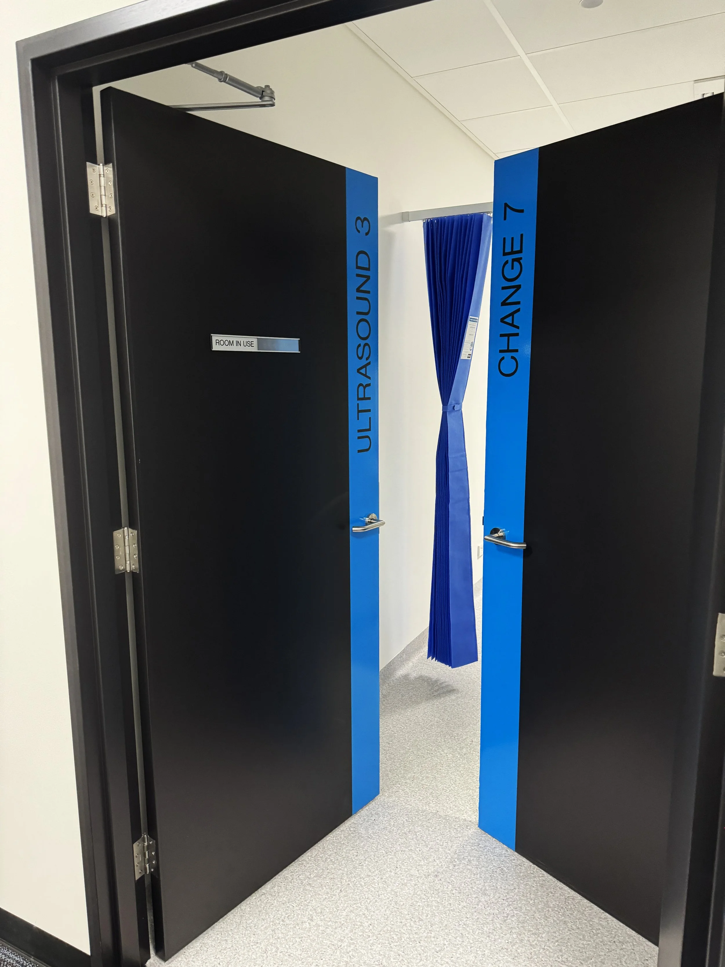 Vinyl graphics to doors