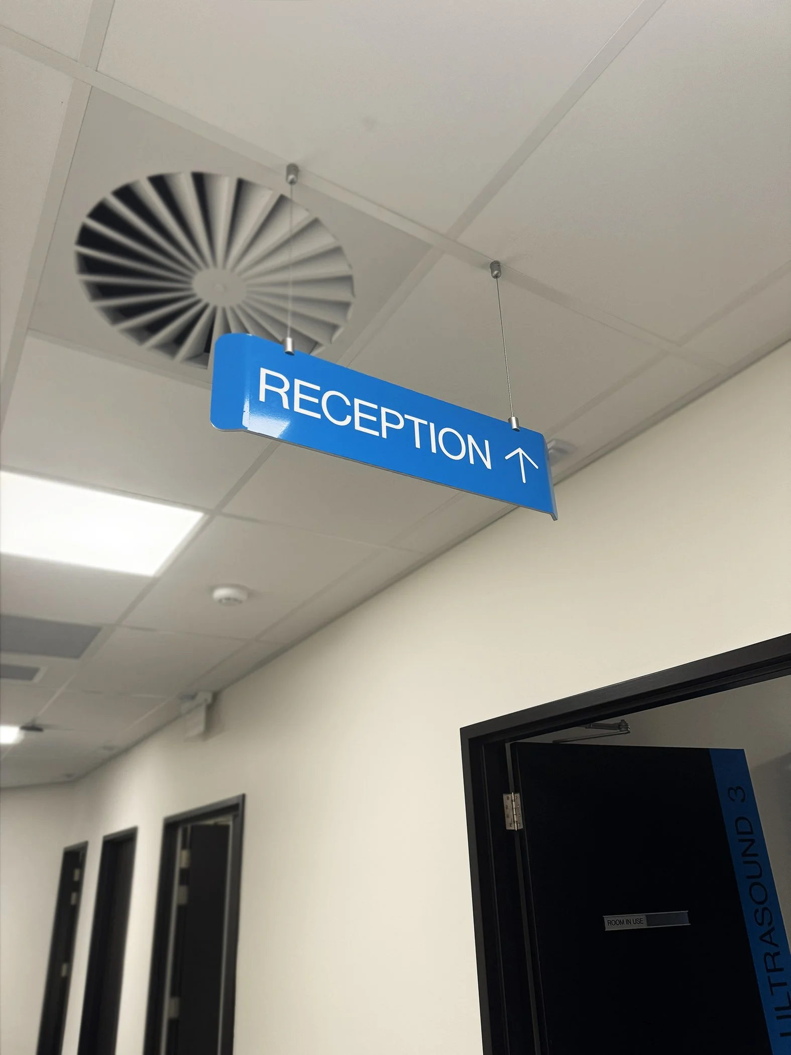 Hanging acrylic with vinyl graphics