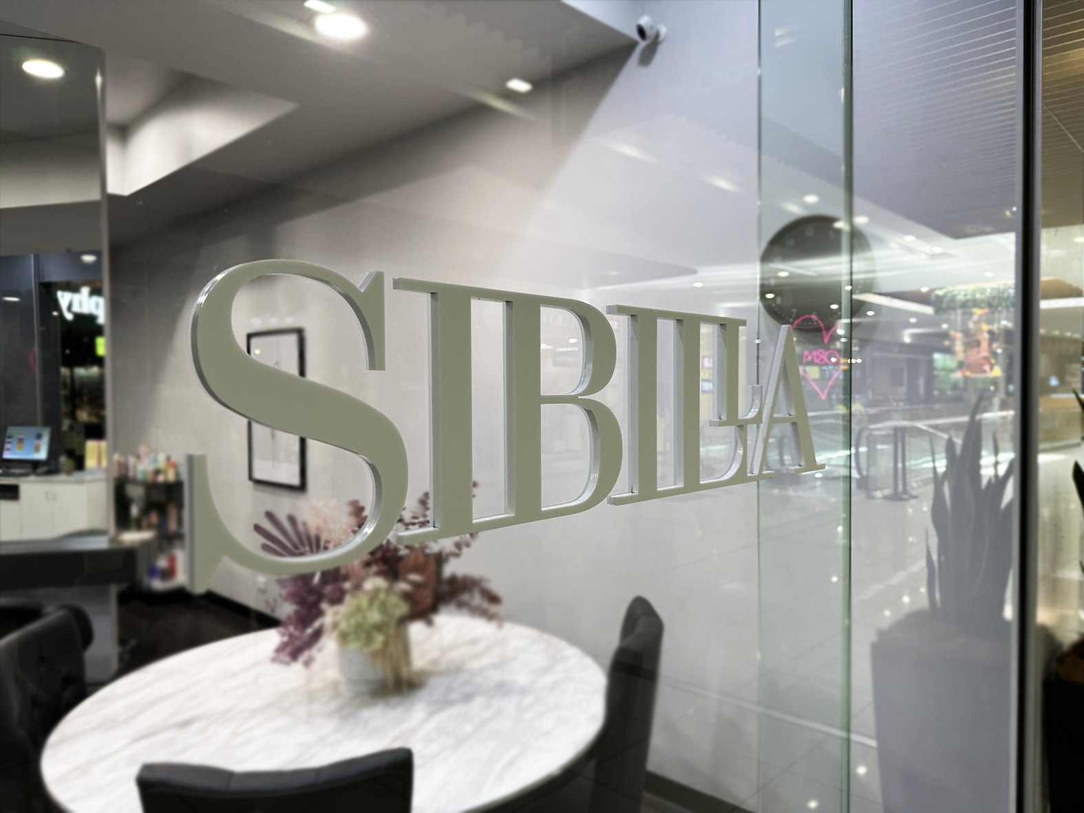 Acrylic logo to window 