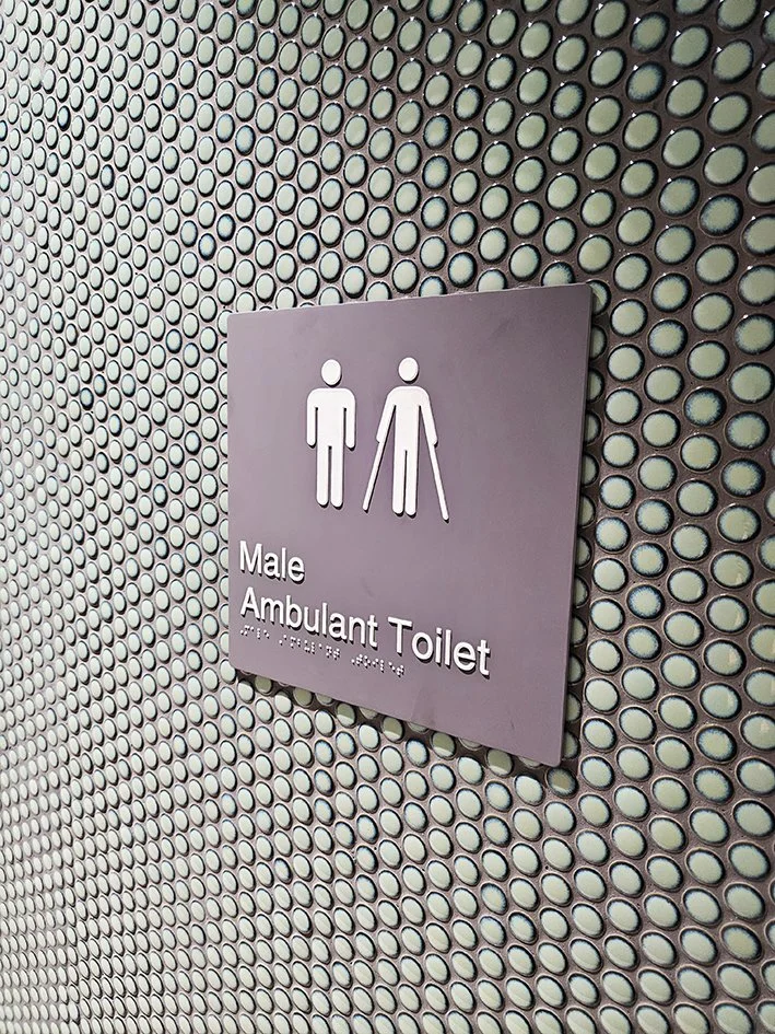 Custom braille signs