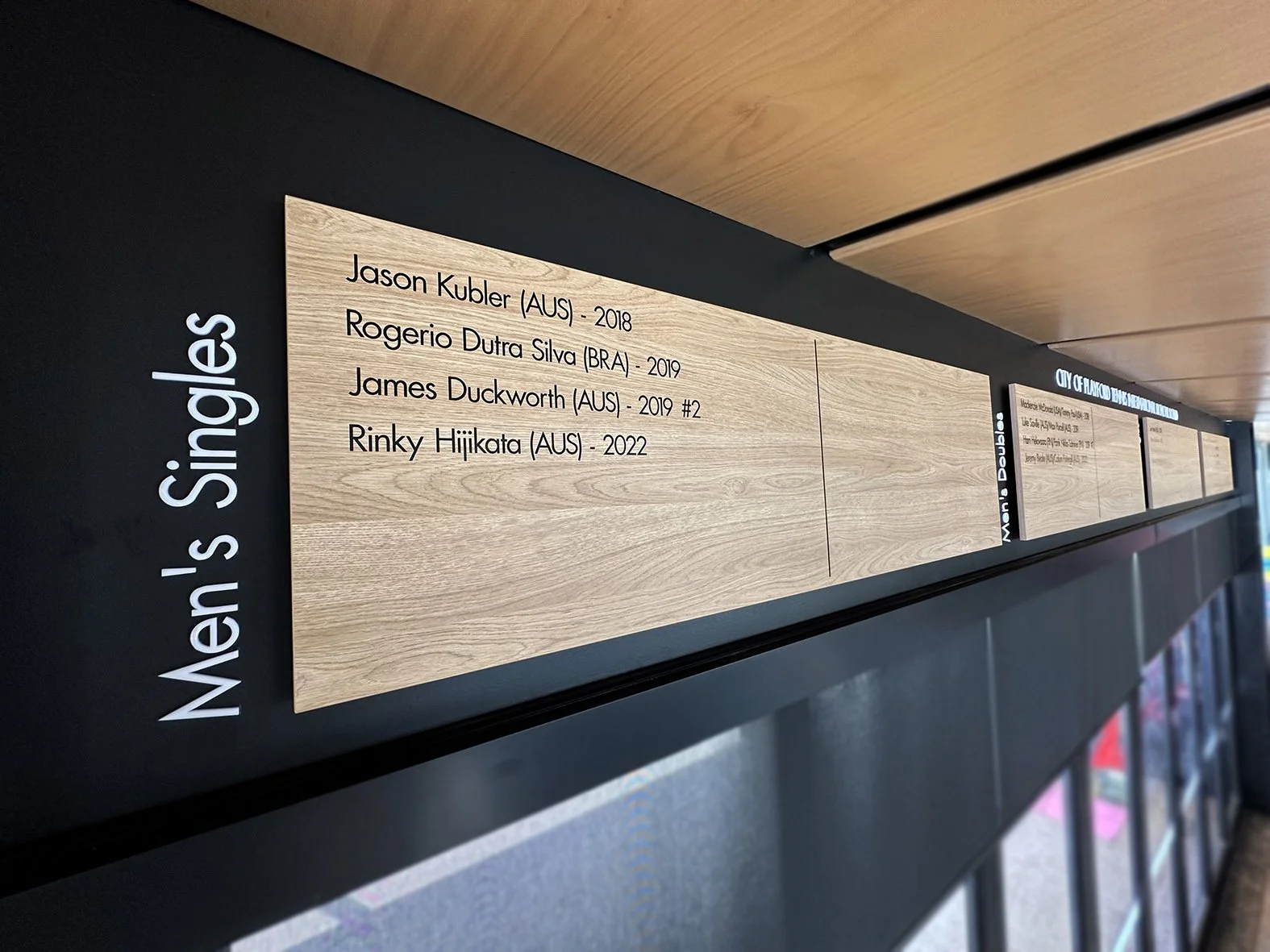 Timber boards with vinyl lettering