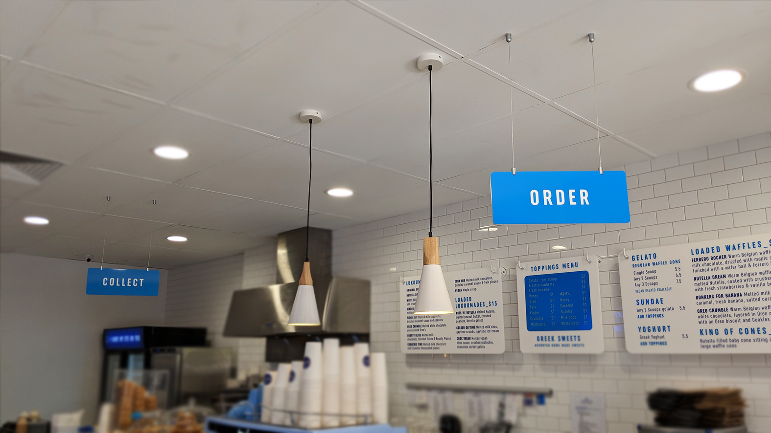 Hanging menu boards vinyl lettering