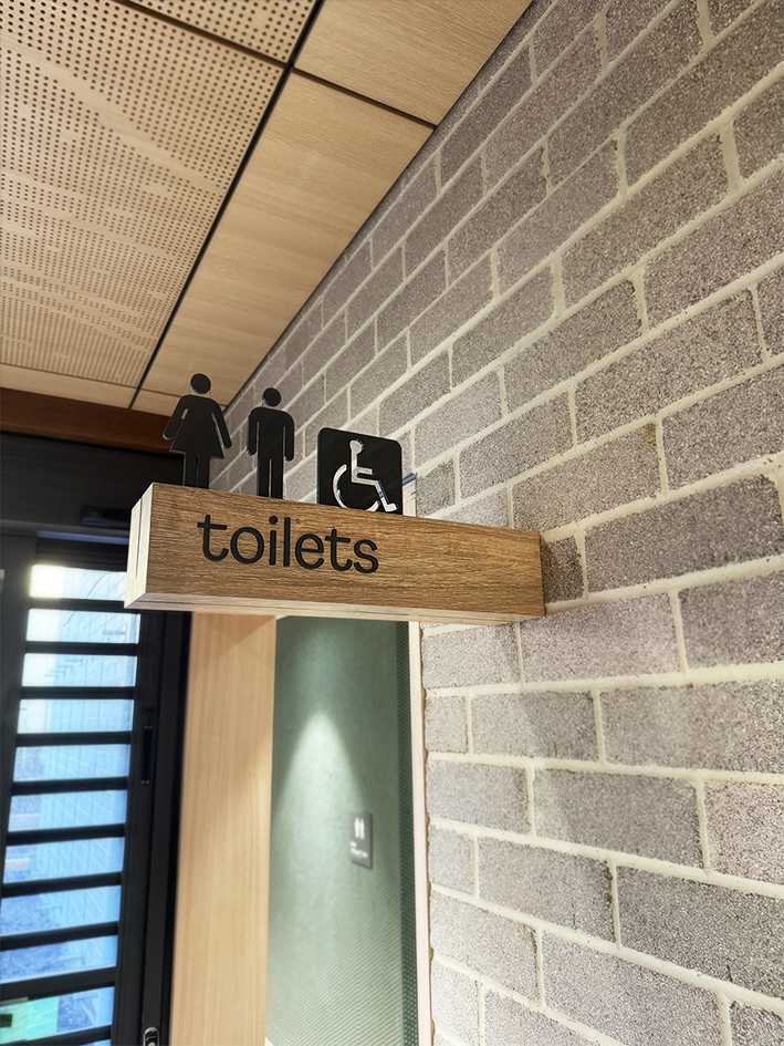Wall mounted timber with acrylic lettering & symbols