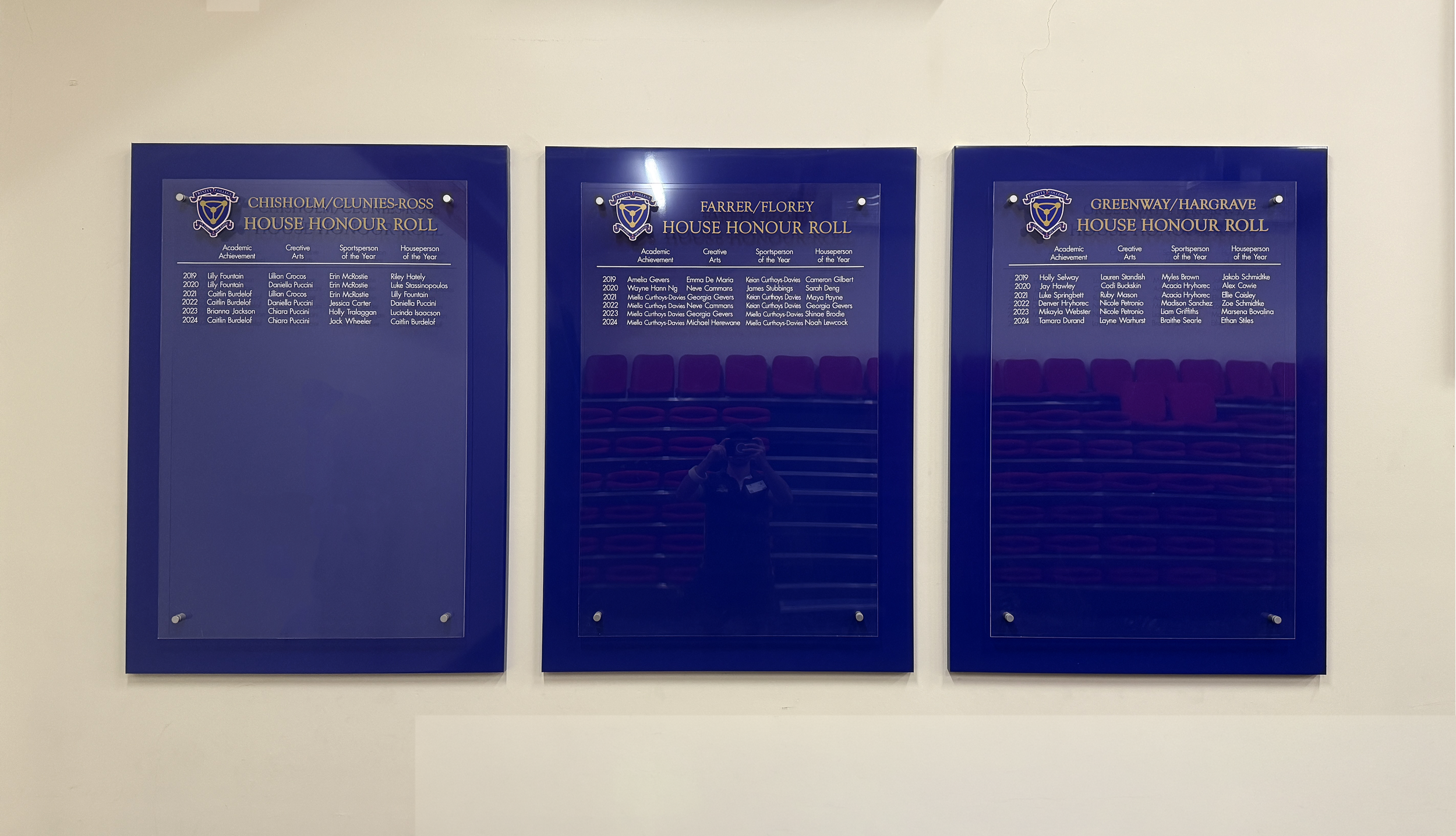 Wall mounted double layered acrylics with vinyl lettering