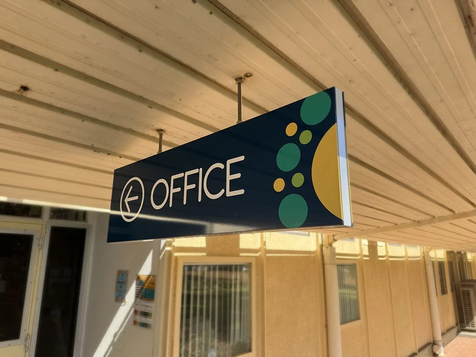 Hanging directional signage