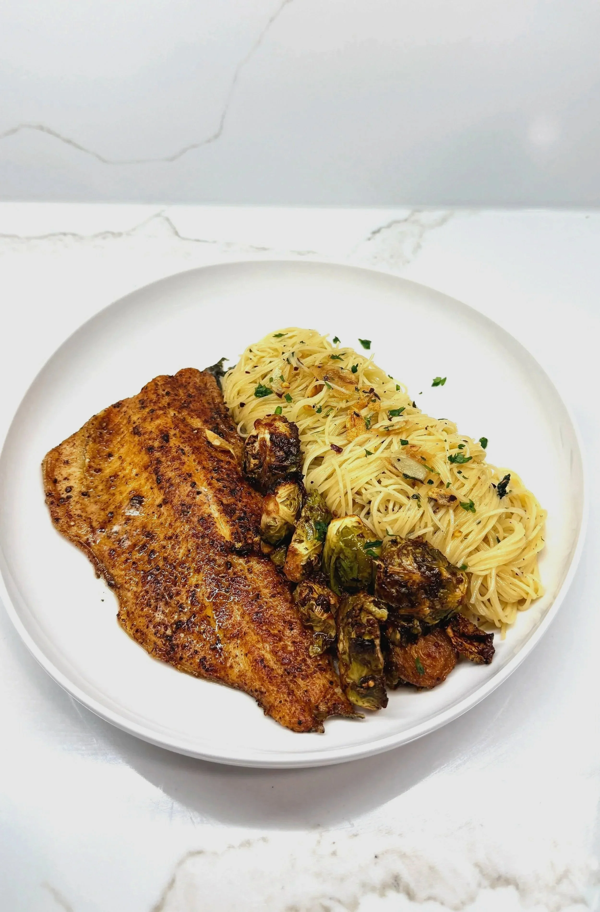 Pan-seared Rainbow Trout with Aglio e olio &amp; Roasted Brussels Sprouts