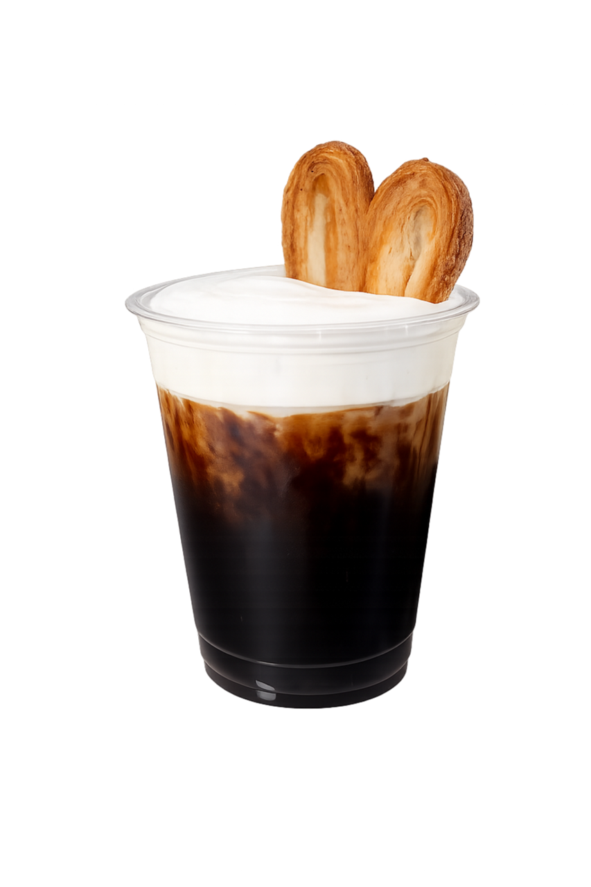 Einspanner coffee. Iced coffee with cold foam and cookie. 