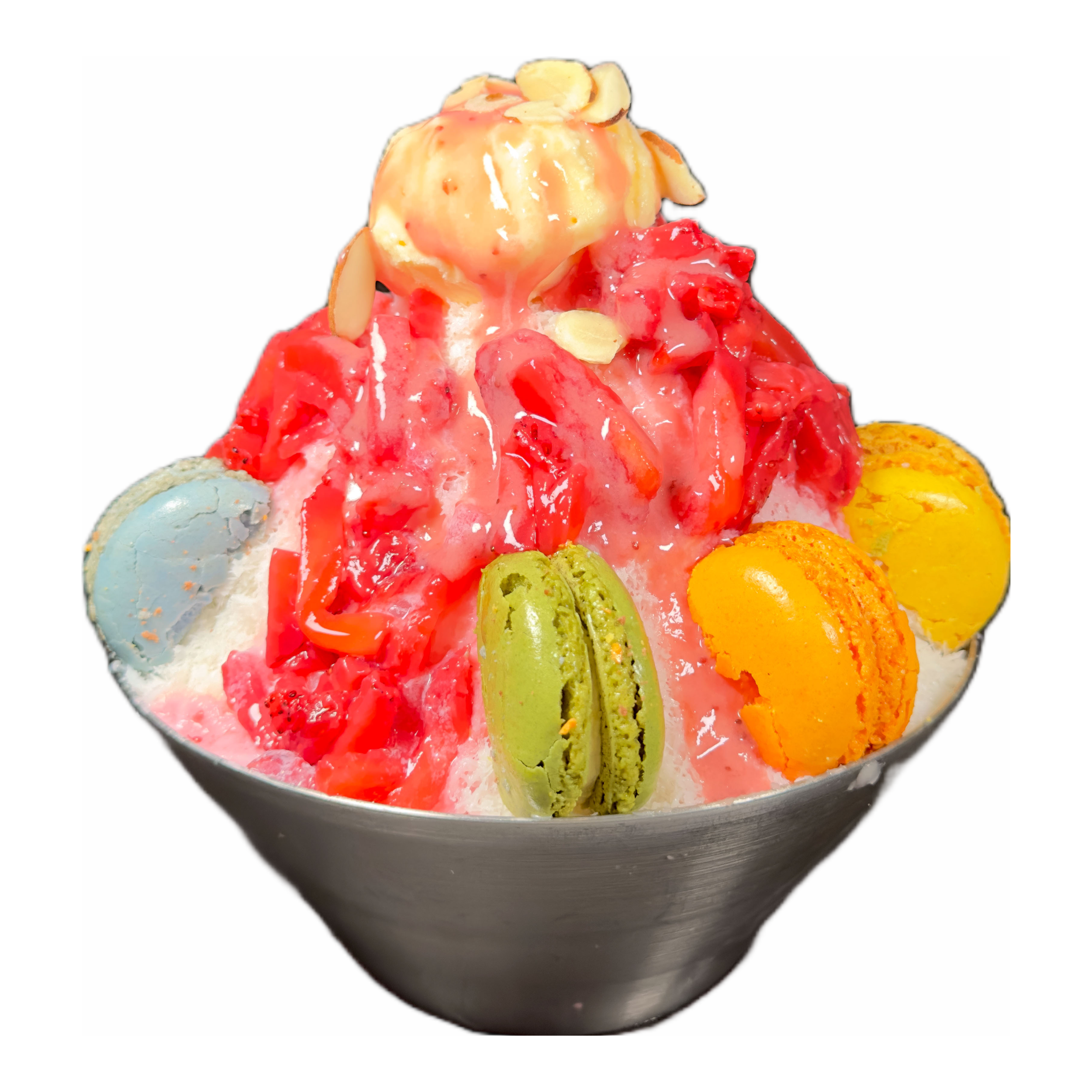 A bowl of shaved ice topped with macarons and sliced strawberries