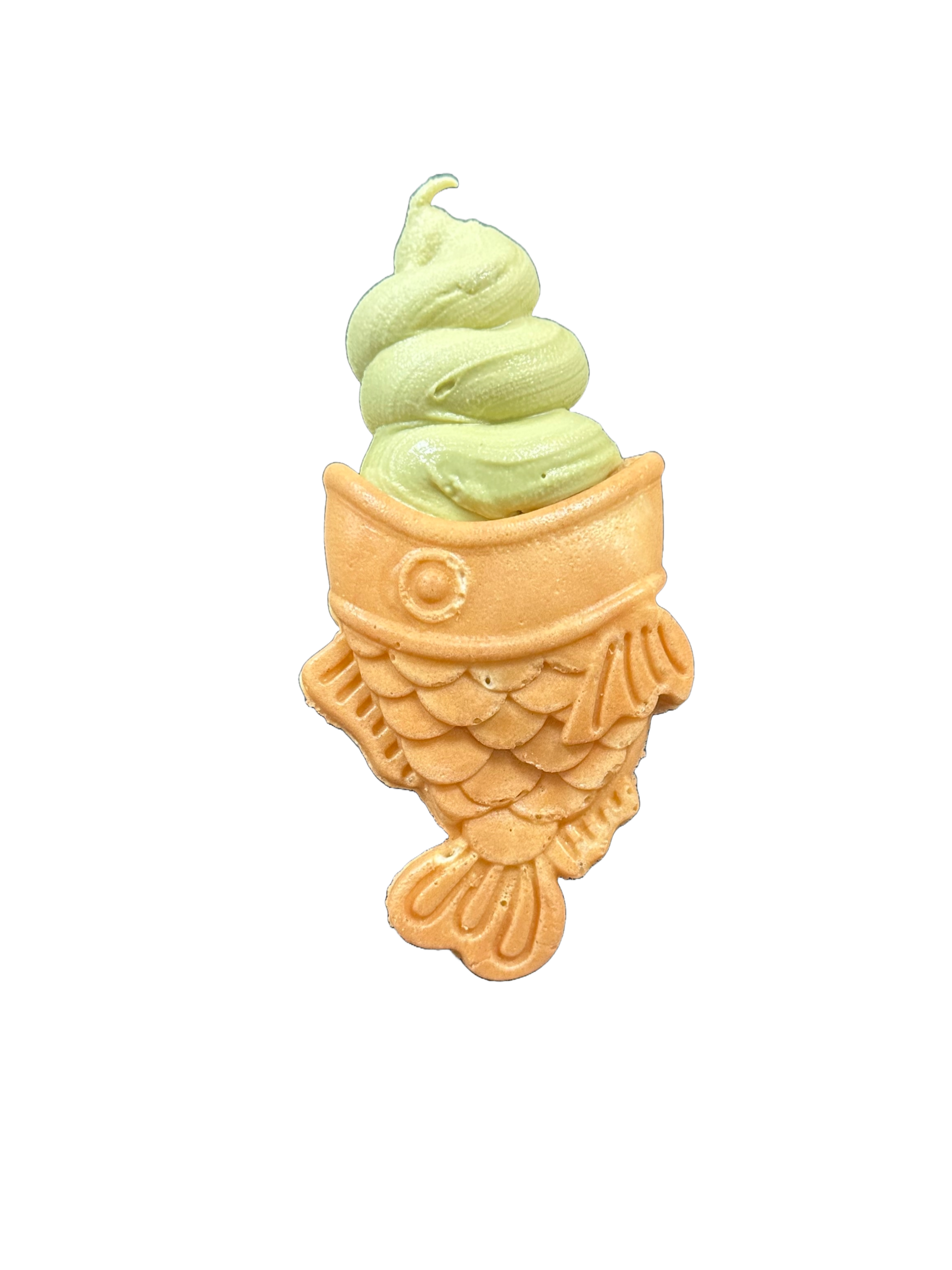 Matcha ice cream in a fish-shaped cone taiyaki.