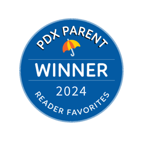 Blue circular badge with the text 'PDX Parent Winner 2024 Reader Favorites' and a yellow and orange umbrella icon.