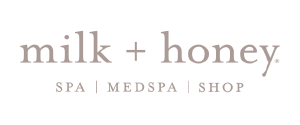 Logo for milk + honey spa medspa shop with soft purple text