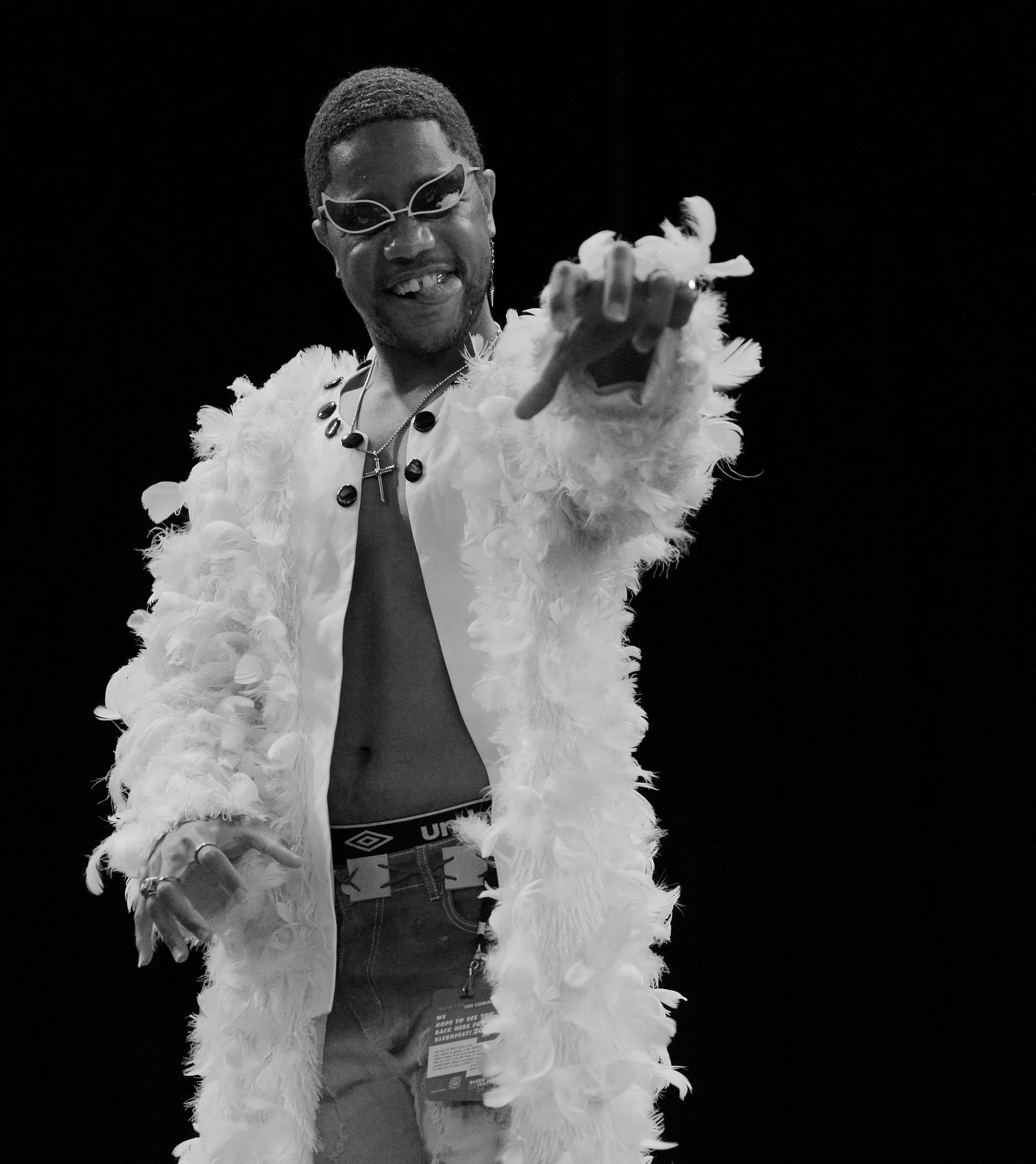 Black-and-white Doflamingo cosplay portrait closing the Blerdfest series