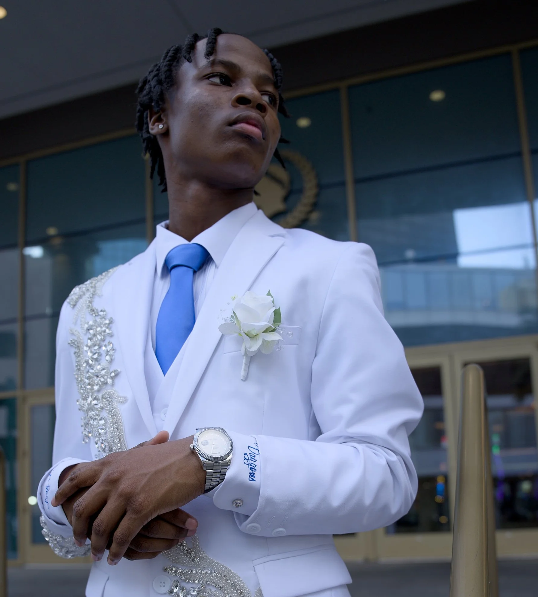 Prom portrait close up blue tie boutonniere white suit Canal Street New Orleans Crescent Lens