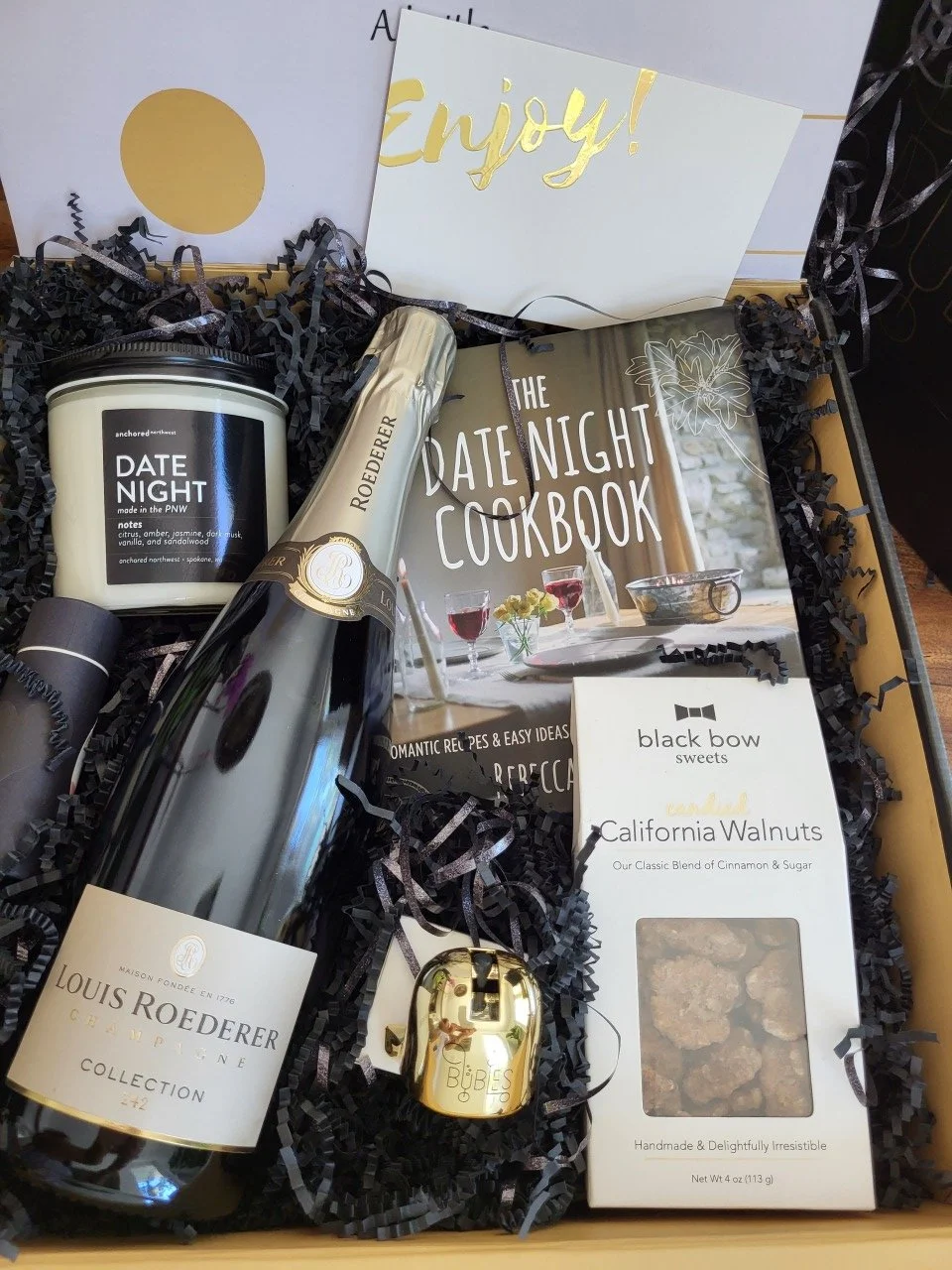 Louis Roederer Collection 242 with a date night book-candle-gourmet snacksjpeg