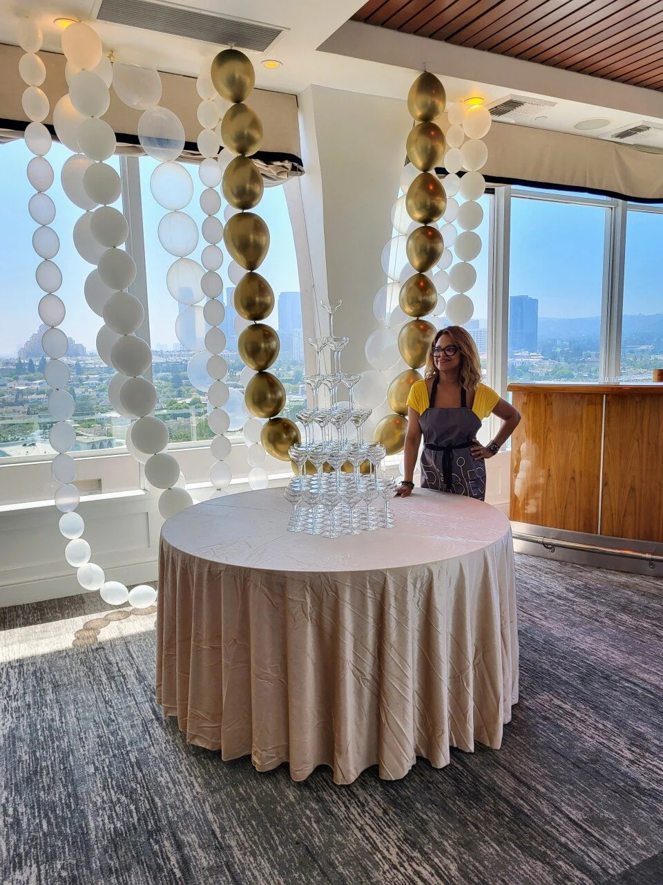Bubles Champagne Founder at work-finished building a 6 tiered champagne tower
