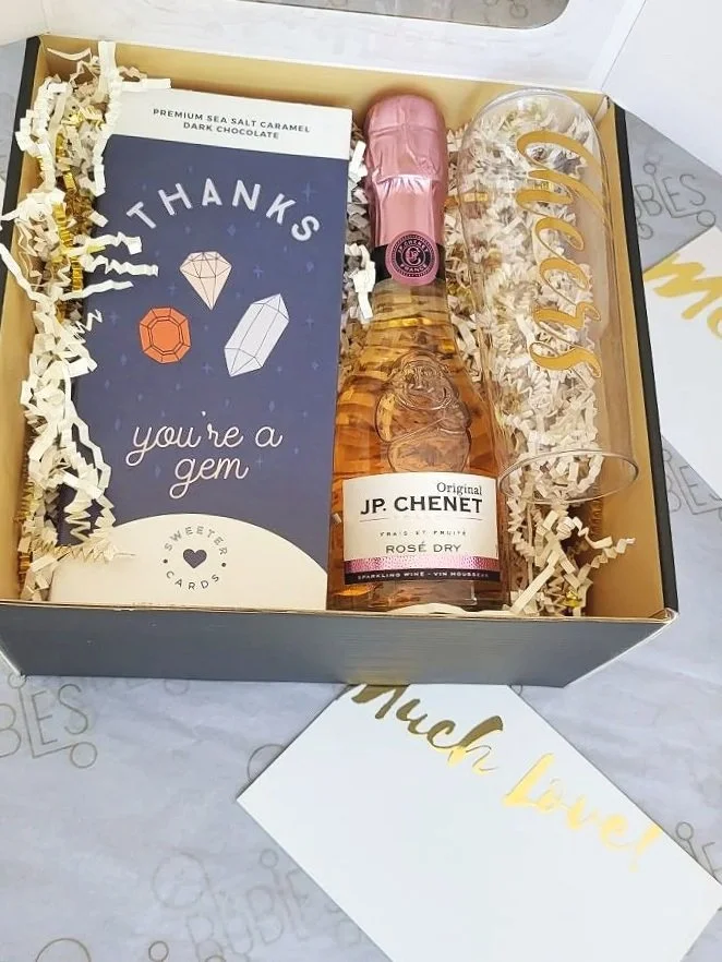 JP Chenet Sparkling mini Rosé with flute and a snack.jpg