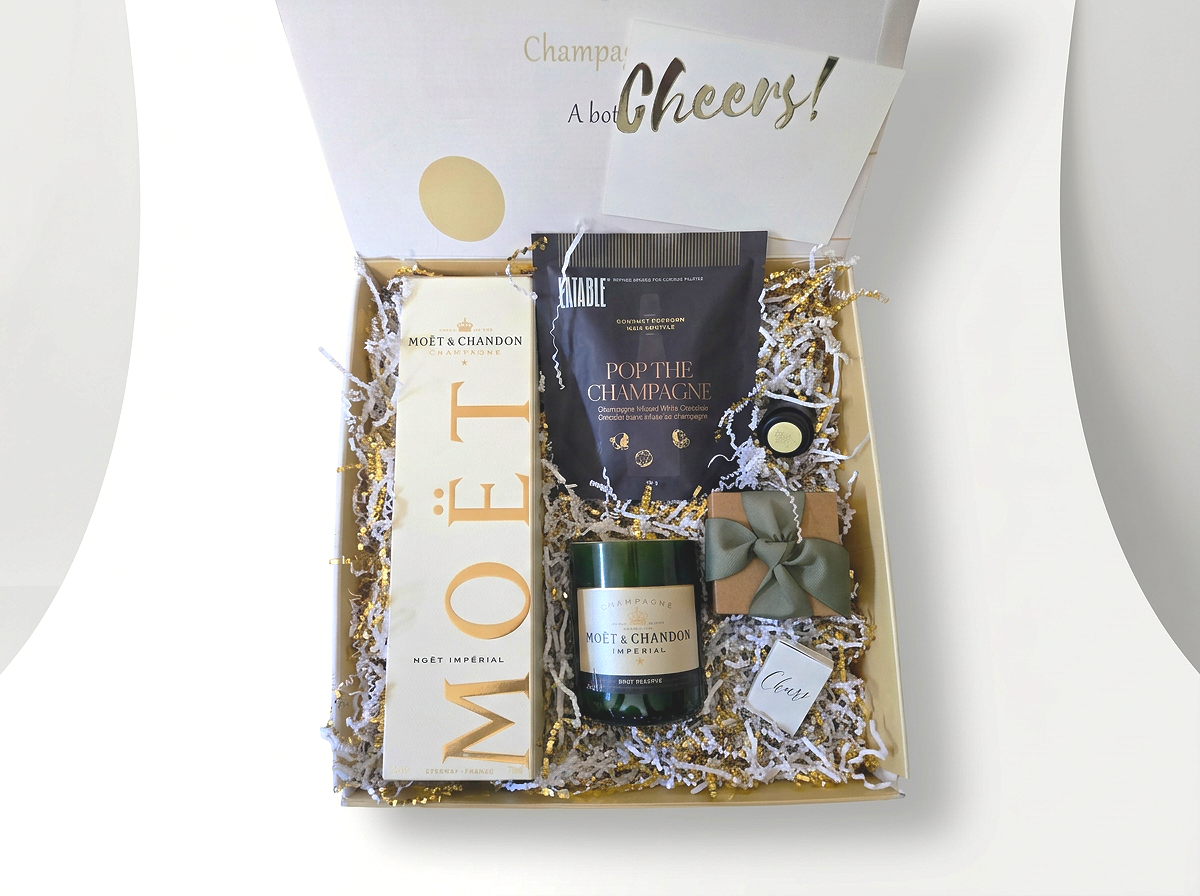 Moët and Chandon Imperial Brut with recycled Soy Candle and gourmet snacks.png