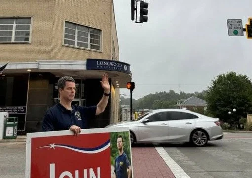 Since our congressman, John McGuire, has time to stand around waving at cars, we suggest putting his time to better use over the House recess. Maybe 10 or 20 or a thousand of us can tell him to push back against Trump&rsquo;s $1.8 billion slush fund 