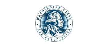 Logo of Washington State Bar Association featuring a profile of a classical figure with flowing hair, surrounded by a circular border with the organization name.