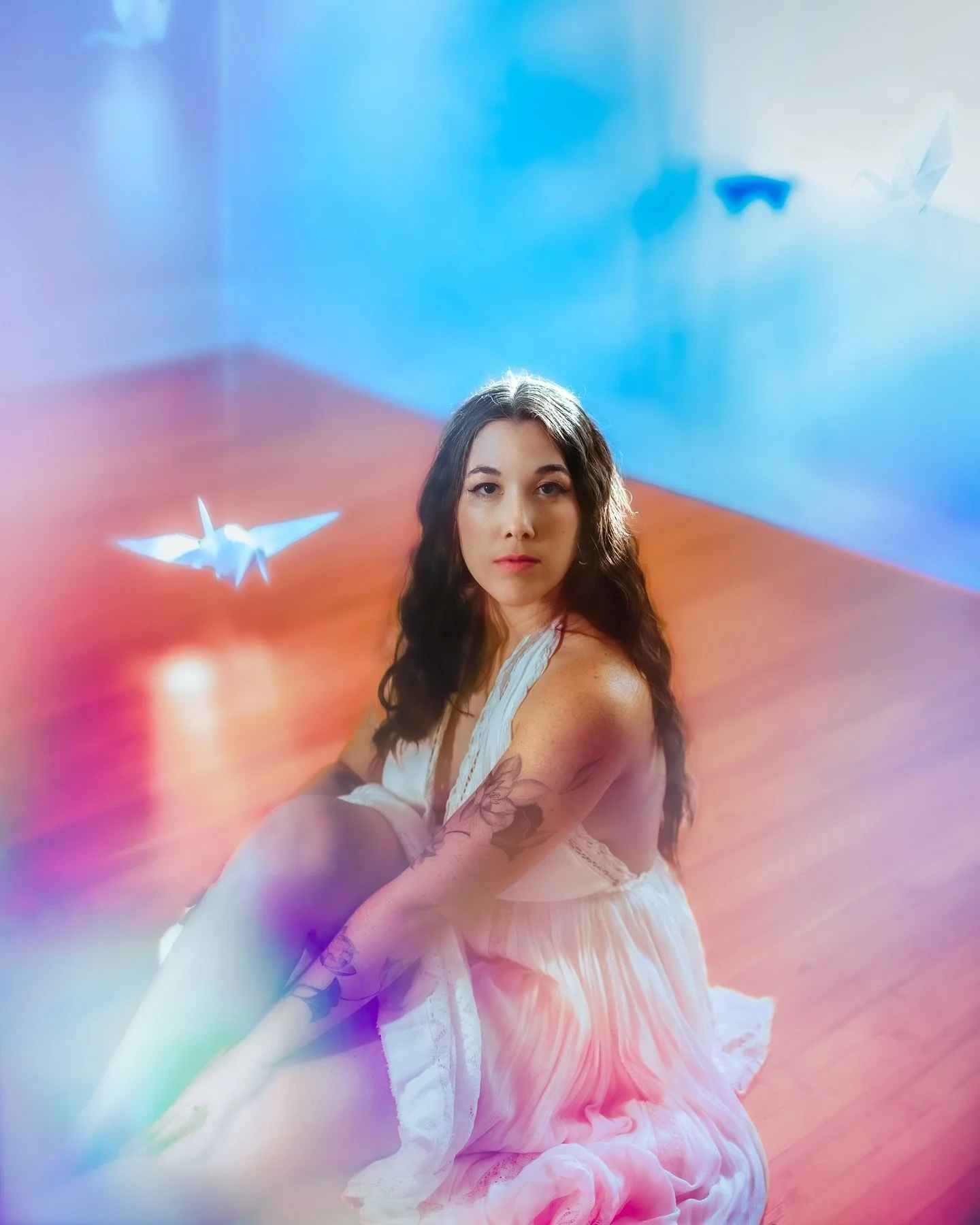 Last summer @hannahlainemusic &amp; I cleared my living room to hang up ~100 paper cranes from the ceiling to turn it into a hazy dreamscape land for photos celebrating her incredible upcoming EP release -&amp; here are a handful of my personal favor