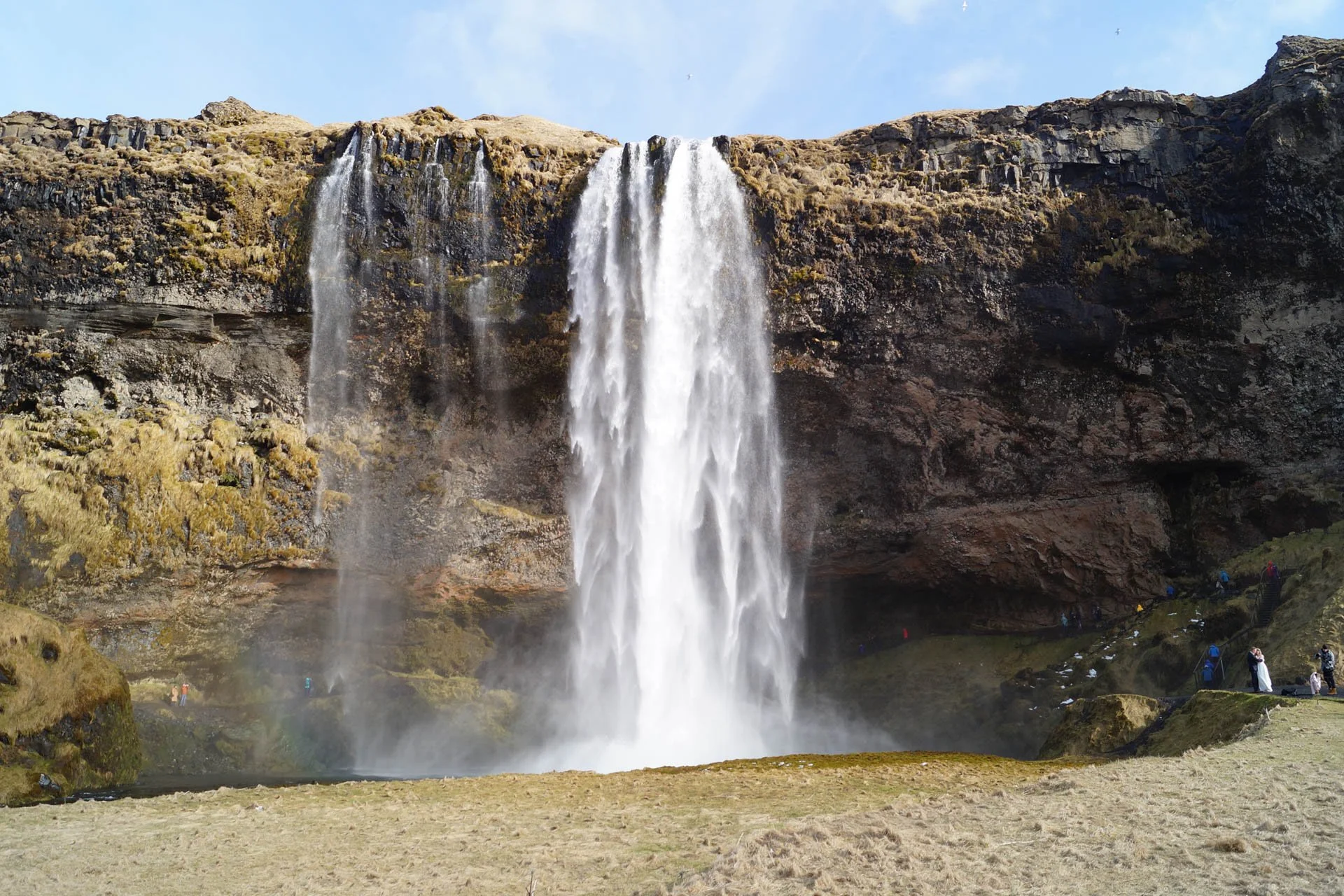 Seljalandsfoss - these falls have a cave behind them and there's a path that leads hikers behind the falls. Henry and I did the hike.