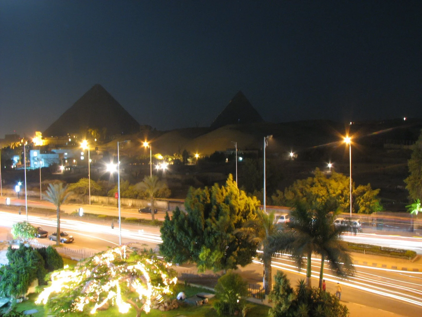 A view of The Pyramids of Giza at night