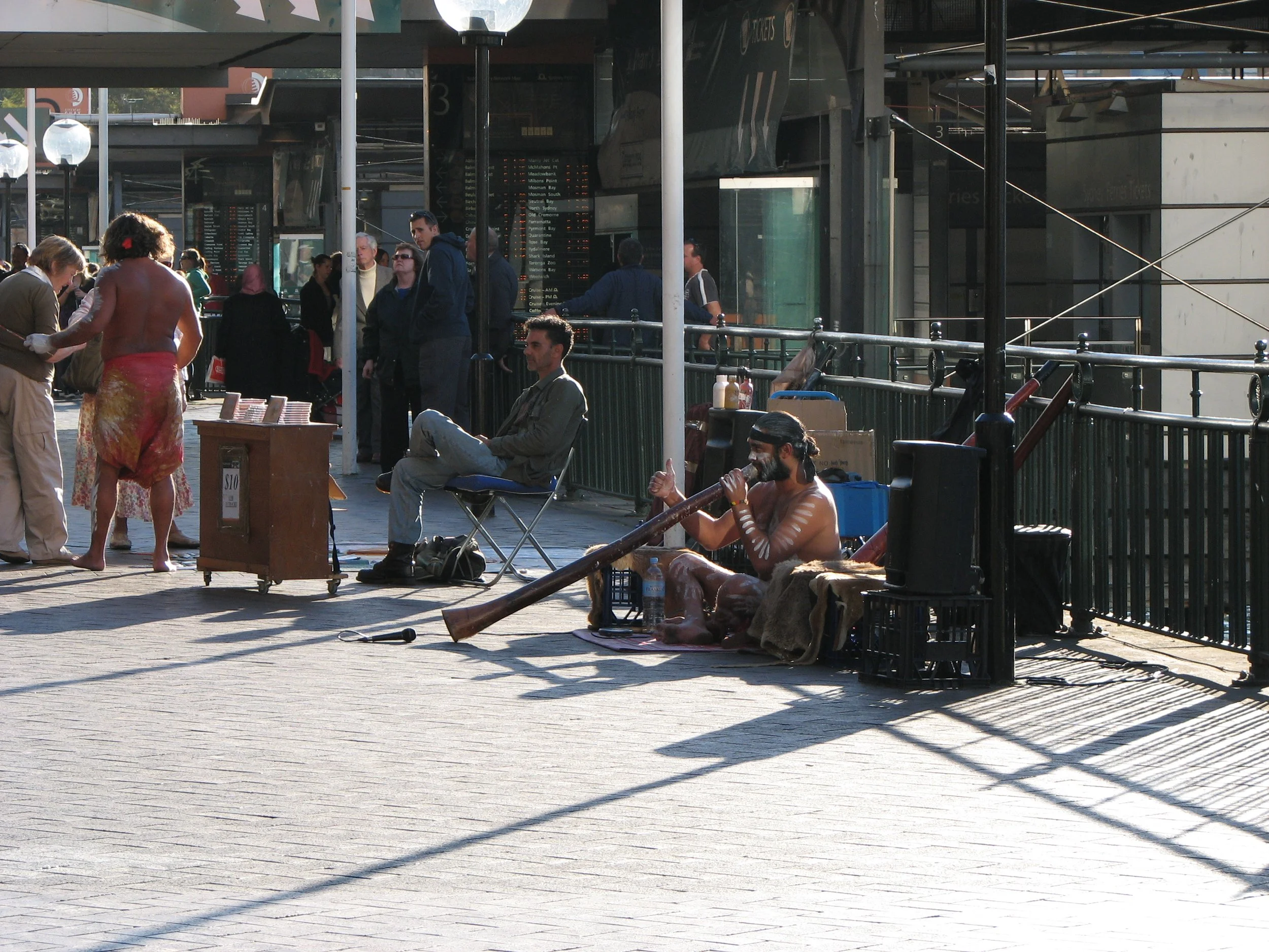 An aboriginal playing the didgeridoo