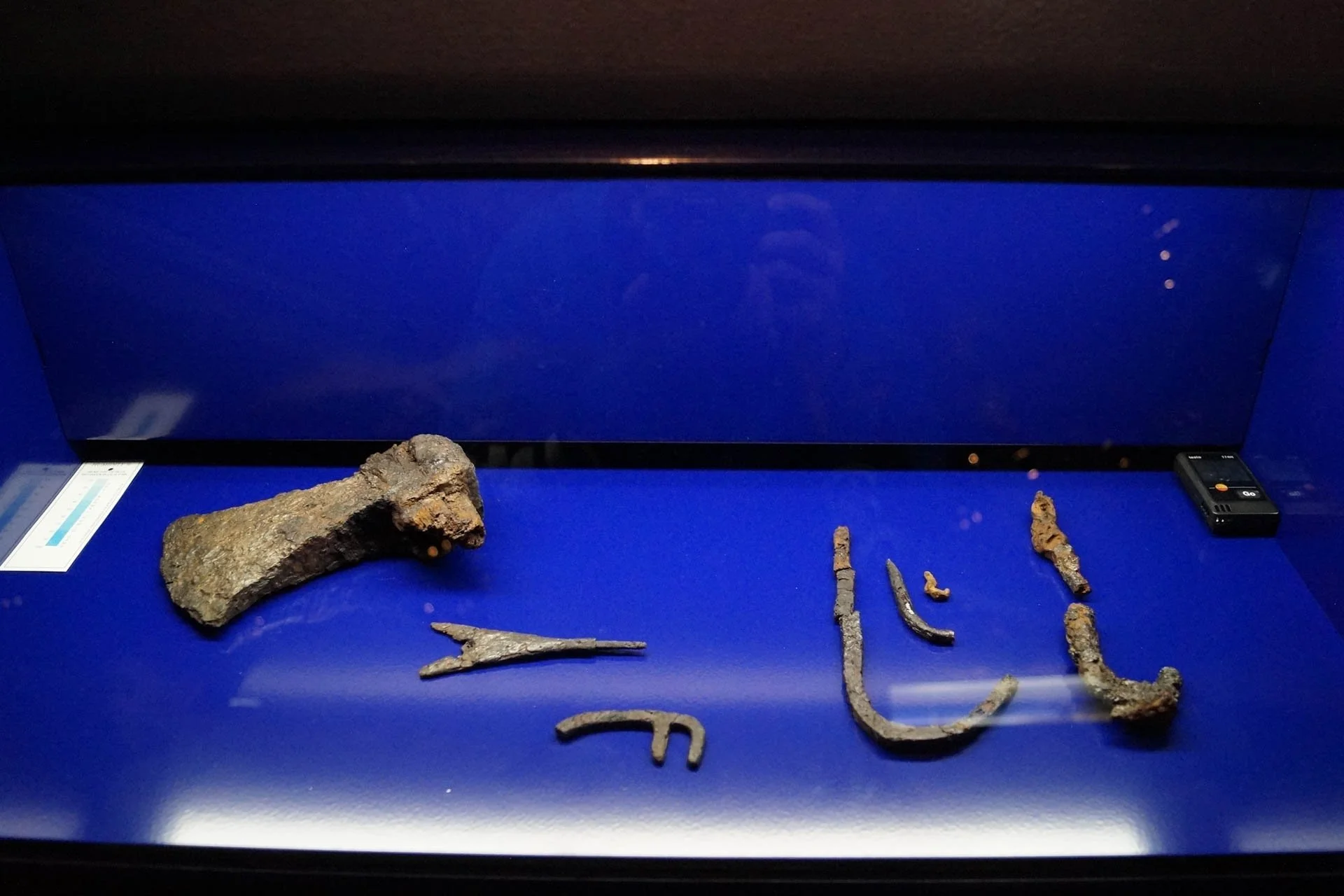 The Settlement Exhibit - Axe head and fish hooks