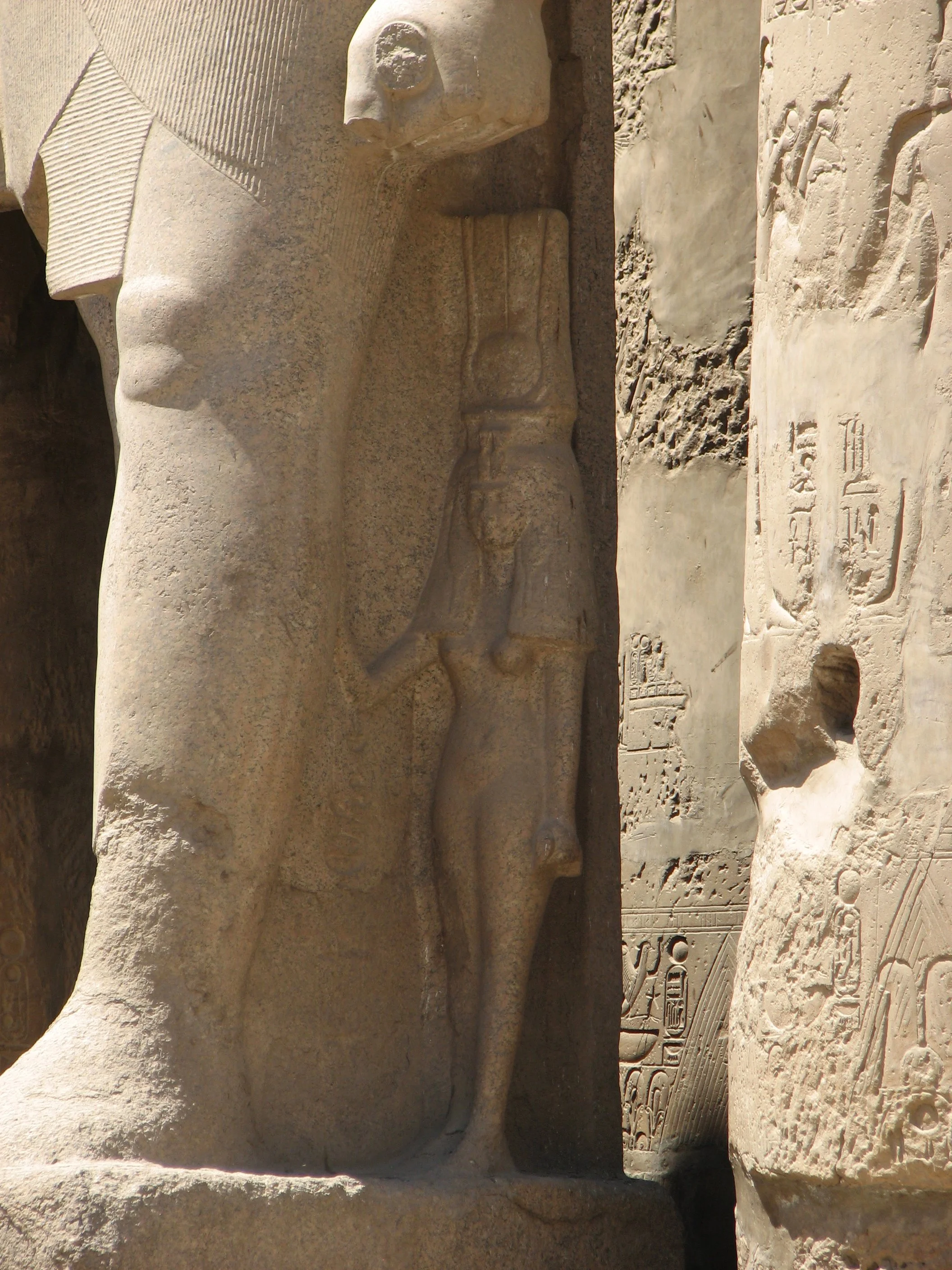 Luxor Temple, Luxor - Wives of Pharaohs were usually depicted as being smaller than the pharaoh they were married to.