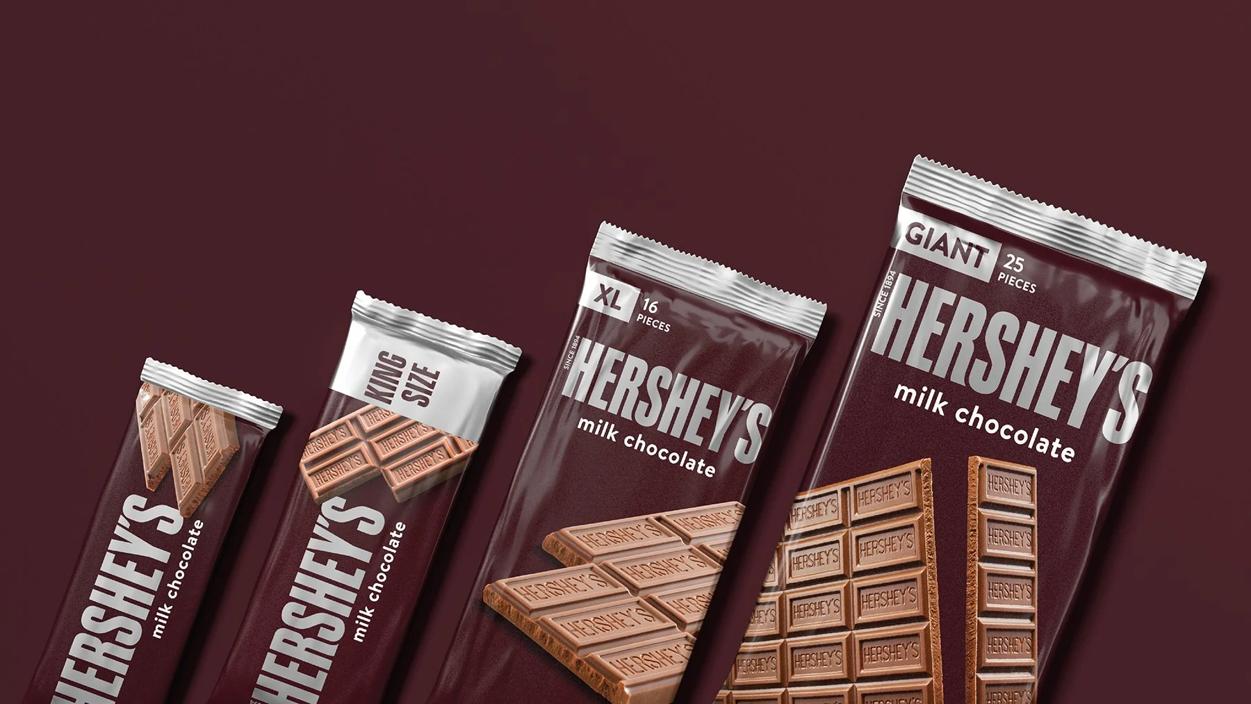 Package of Hershey's milk chocolate bars in different sizes on a maroon background.